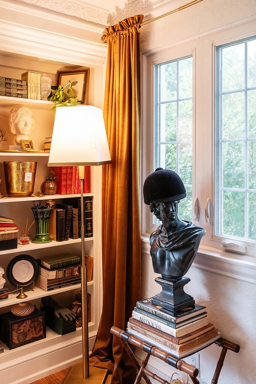 A wider view captures the calm elegance of a Tudor living room, balancing heritage and comfort in a way that feels true to The Gratz Life.