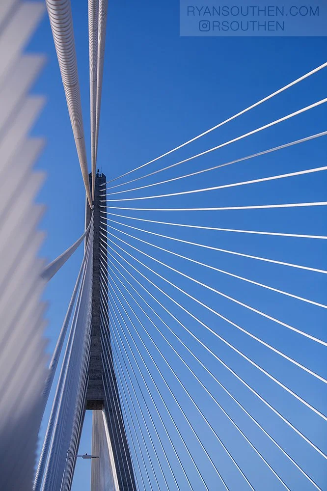 Pedestrians experiencing the Gordie Howe International Bridge between Detroit and Windsor during opening-day festivities.
