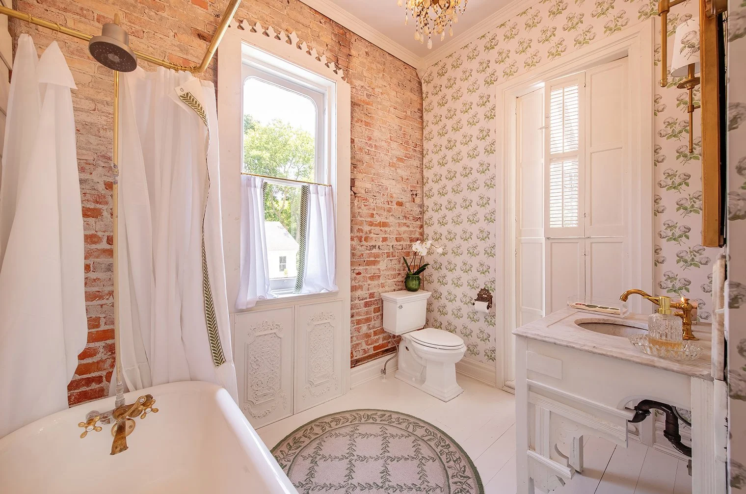 Architectural and interior residential photograph taken of the Iron Victorian for HGTV. This image shows the first floor bathroom.