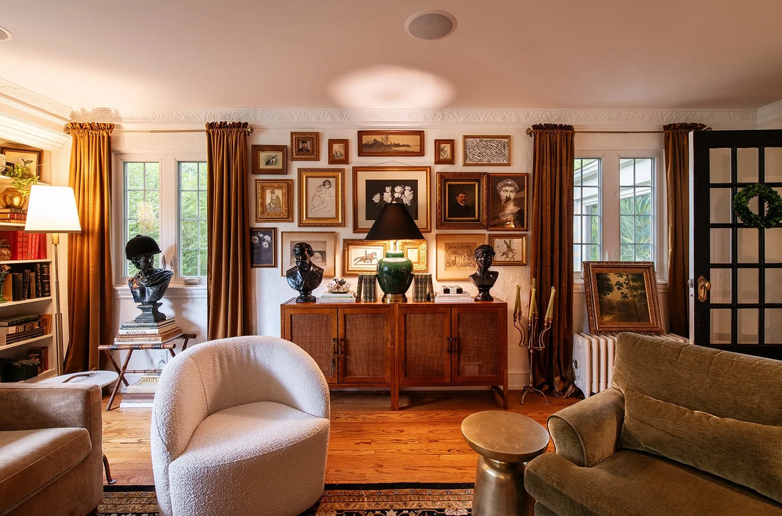 Architectural and interior residential photograph taken of The Gratz Life for HGTV. This image shows the living room of gallery wall.