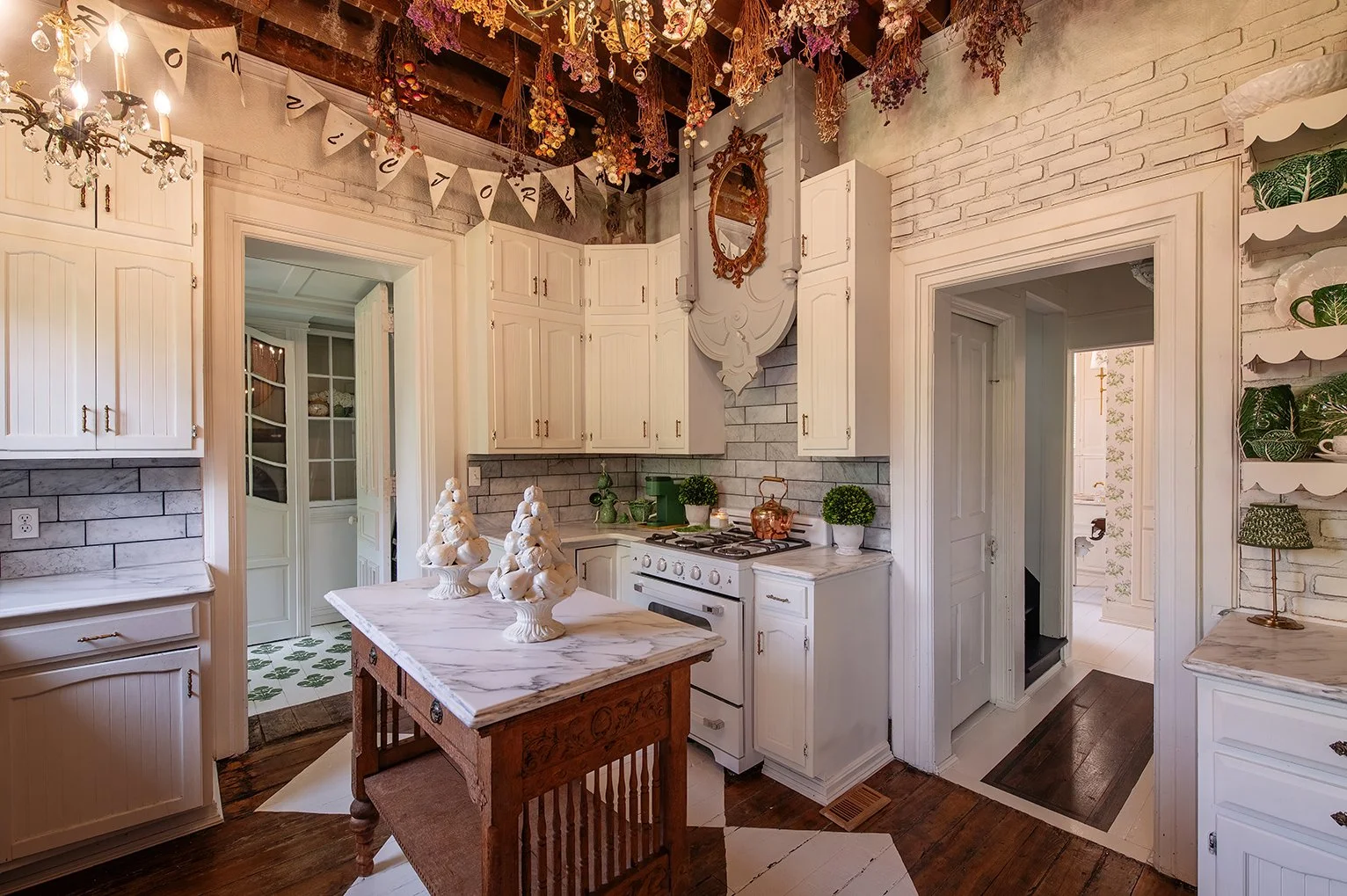 Architectural and interior residential photograph taken of the Iron Victorian for HGTV. This image shows the island in the kitchen.