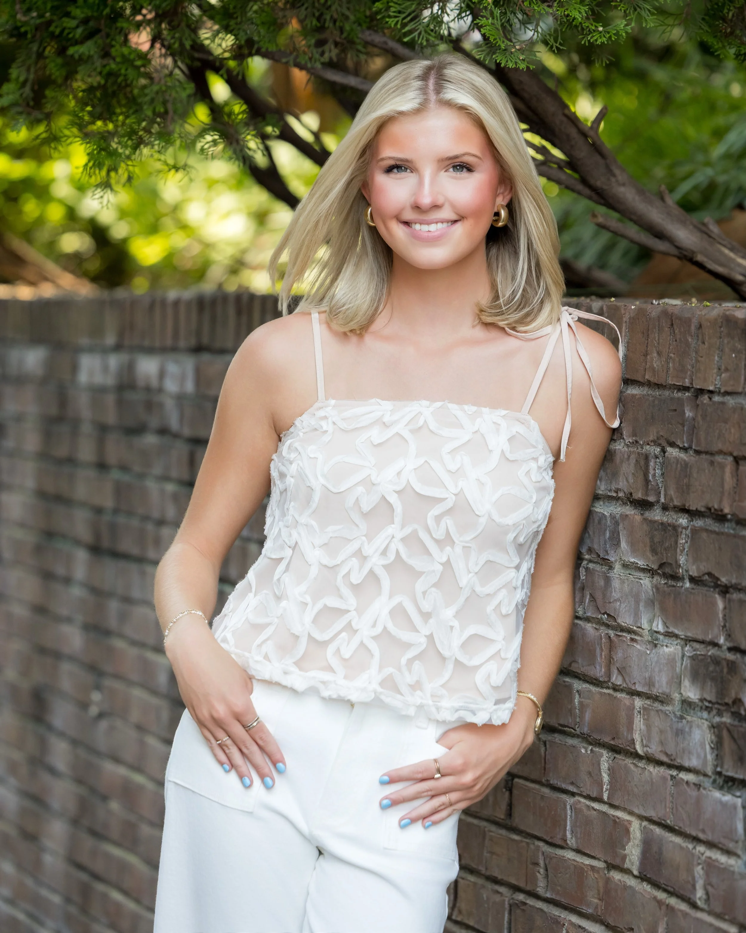 Taylor was literally glowing for her Senior session! The lighting that day was on point and Downtwon Huntsville showed out!