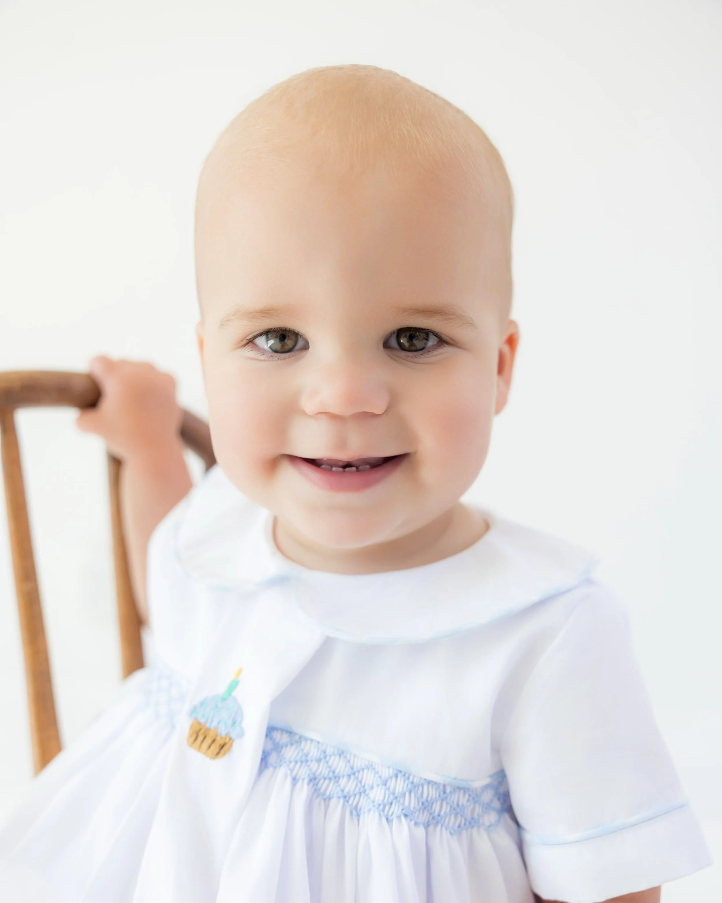 One whole year of smiles, giggles, and keeping everyone on their toes! Celebrating this sweet boy&rsquo;s very first birthday behind the lens - and he brought all the personality.
