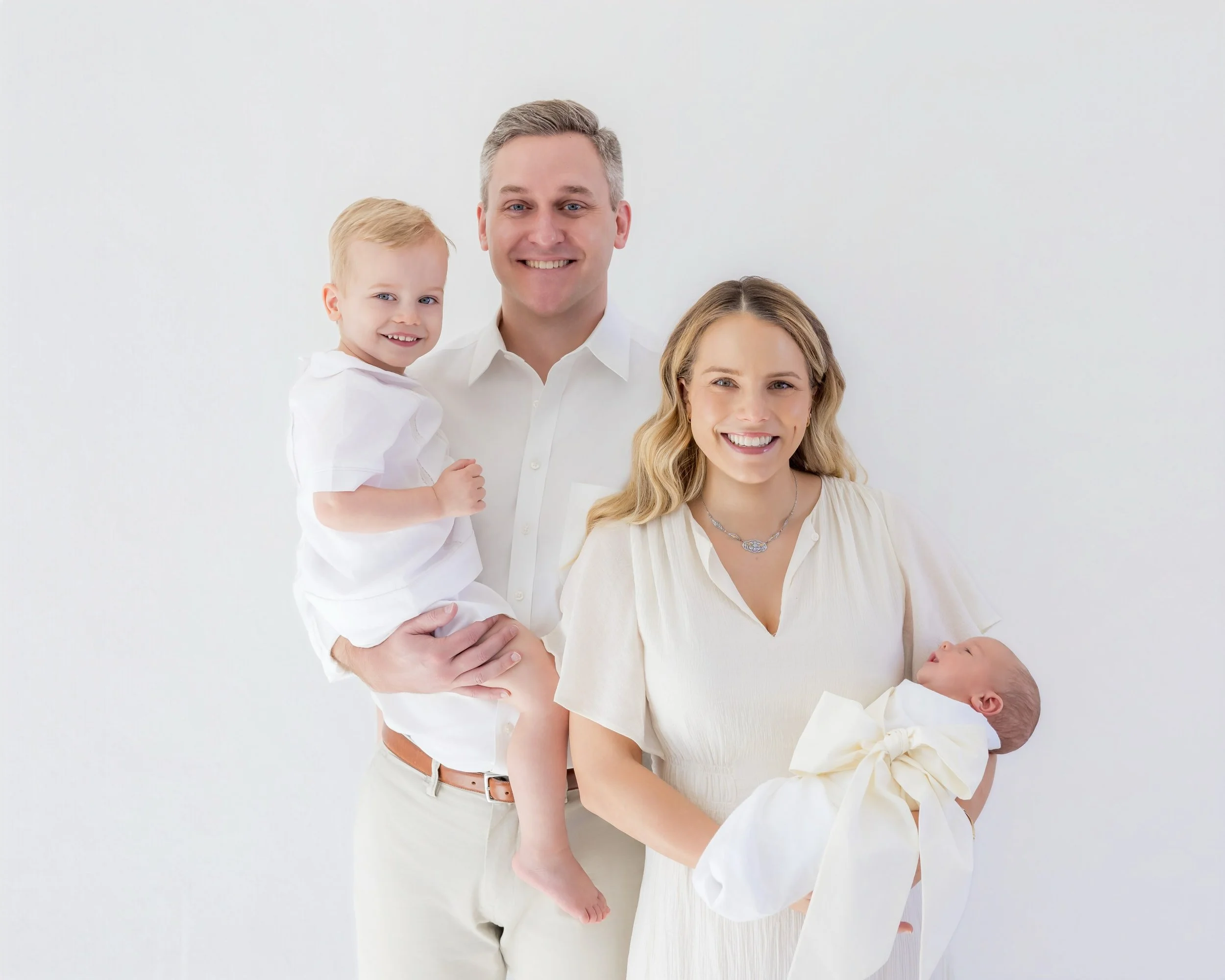 I love the moment when the softest little smile steals the whole shoot. Welcome to the world, Miller!