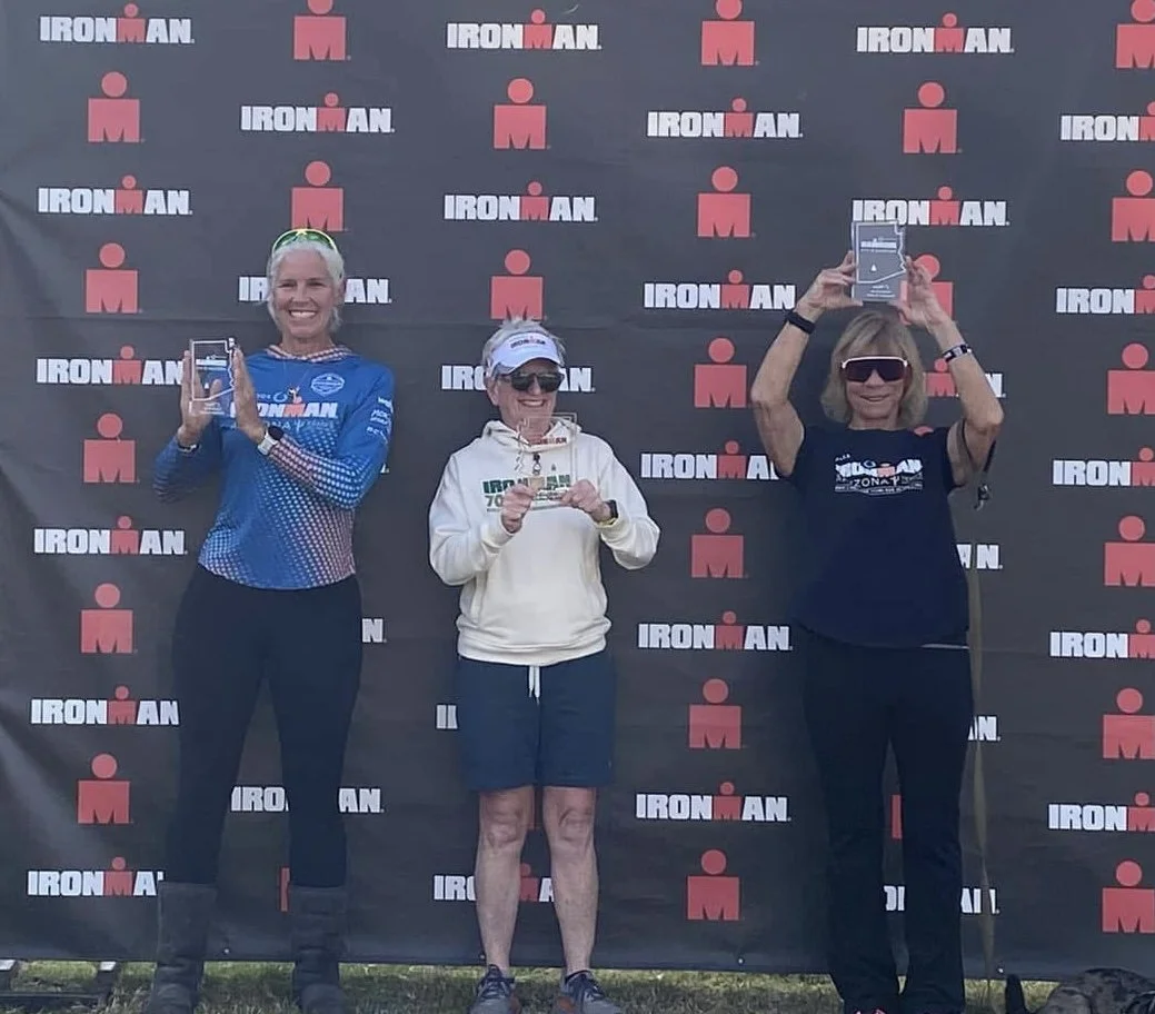 Coach made the podium at Ironman Arizona 2025 after running the marathon is borrowed shoes…. Long story!