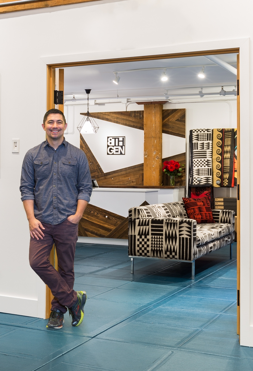 Louie Gong (Nooksack) at Eighth Generation by Inspired Natives in Pike Place Market. Image by Haris Kenjar. 