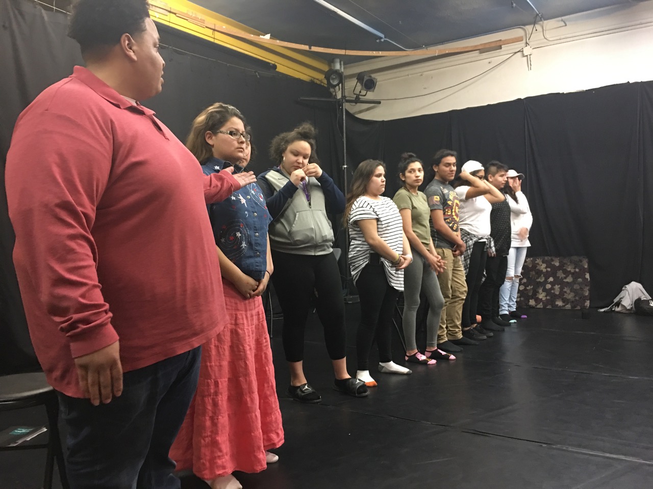 The Ikidowin Peer Educators and Acting Ensemble introduce themselves at the 2017 Fellowship Convening opening at Pangea World Theater. 