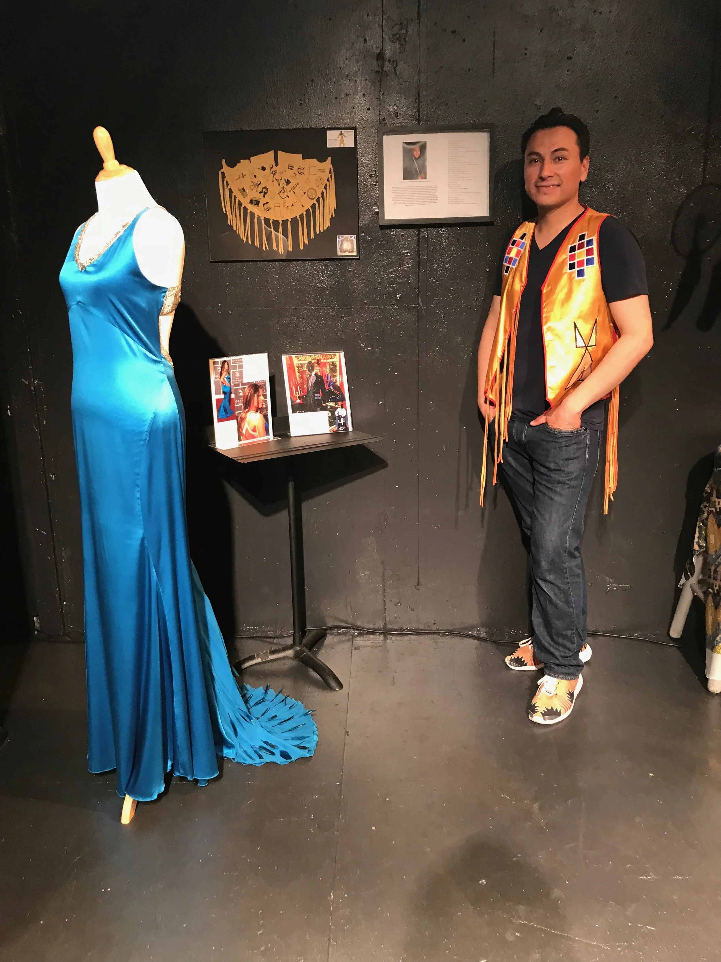 Sheldon with the dress he designed that was worn by Jana Mashonee at the 2007 GRAMMY Awards.