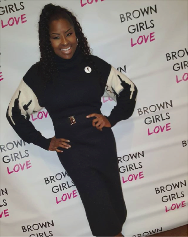 @kimroxie founder of LAMIK Beauty rocking The Golden Lotus "My Melanin is Golden" Pin