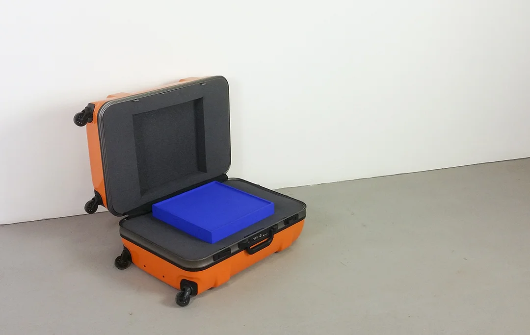 Baggage, 2017. 67 x 40 x 29cm. Suitcase, foam, timber canvas, choma key blue paint.