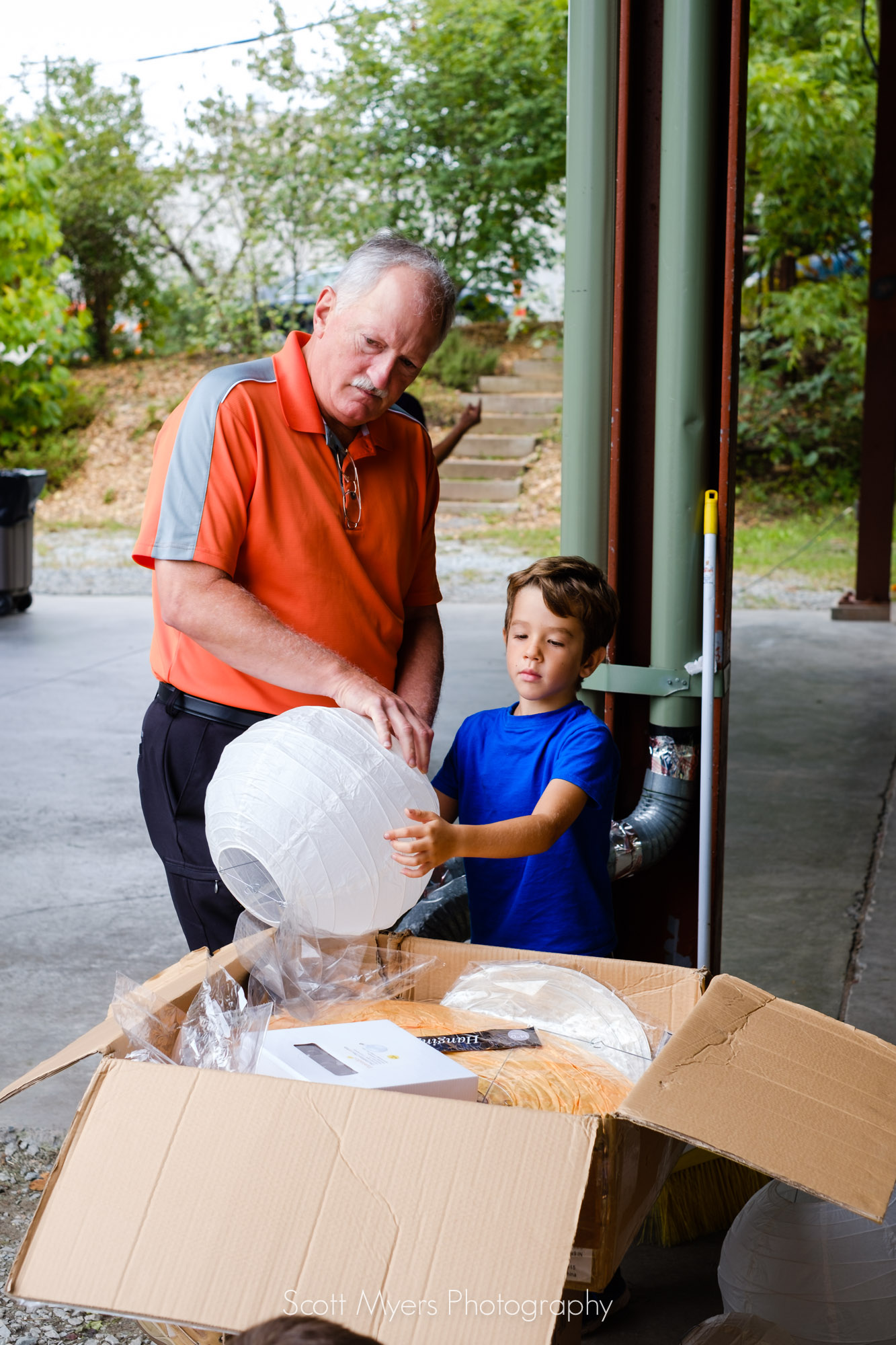 My uncle Richard, and my nephew Theodore, putting together paper lanterns