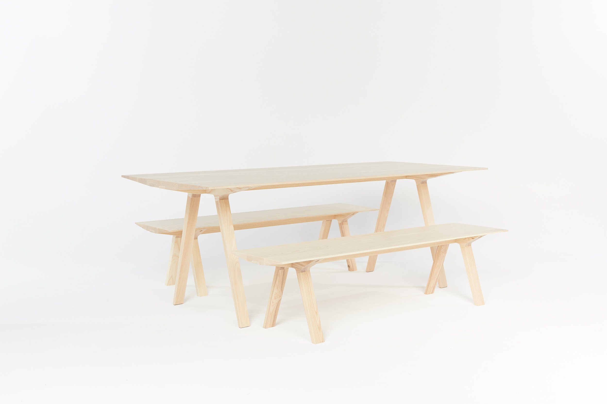 The Louis Dining Table and bench seats - designed by Tom Fereday and made by Mast. Photo courtesy of Mast.
