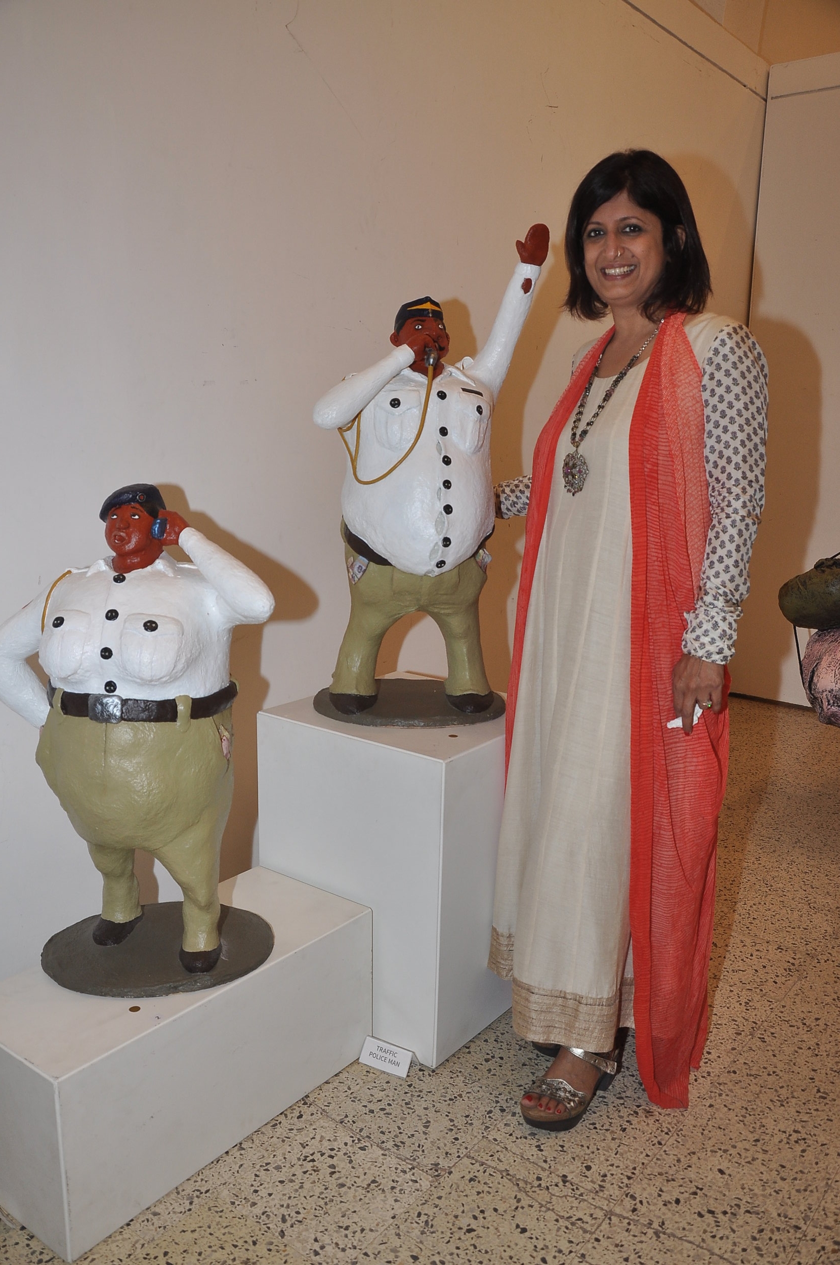  Artist Bharati Pitre with her sculptures (Traffic Police Man &amp; Woman)&nbsp;at the opening of her show 'What a Wonderful World' at Jehangir Art Gallery, Mumbai. 