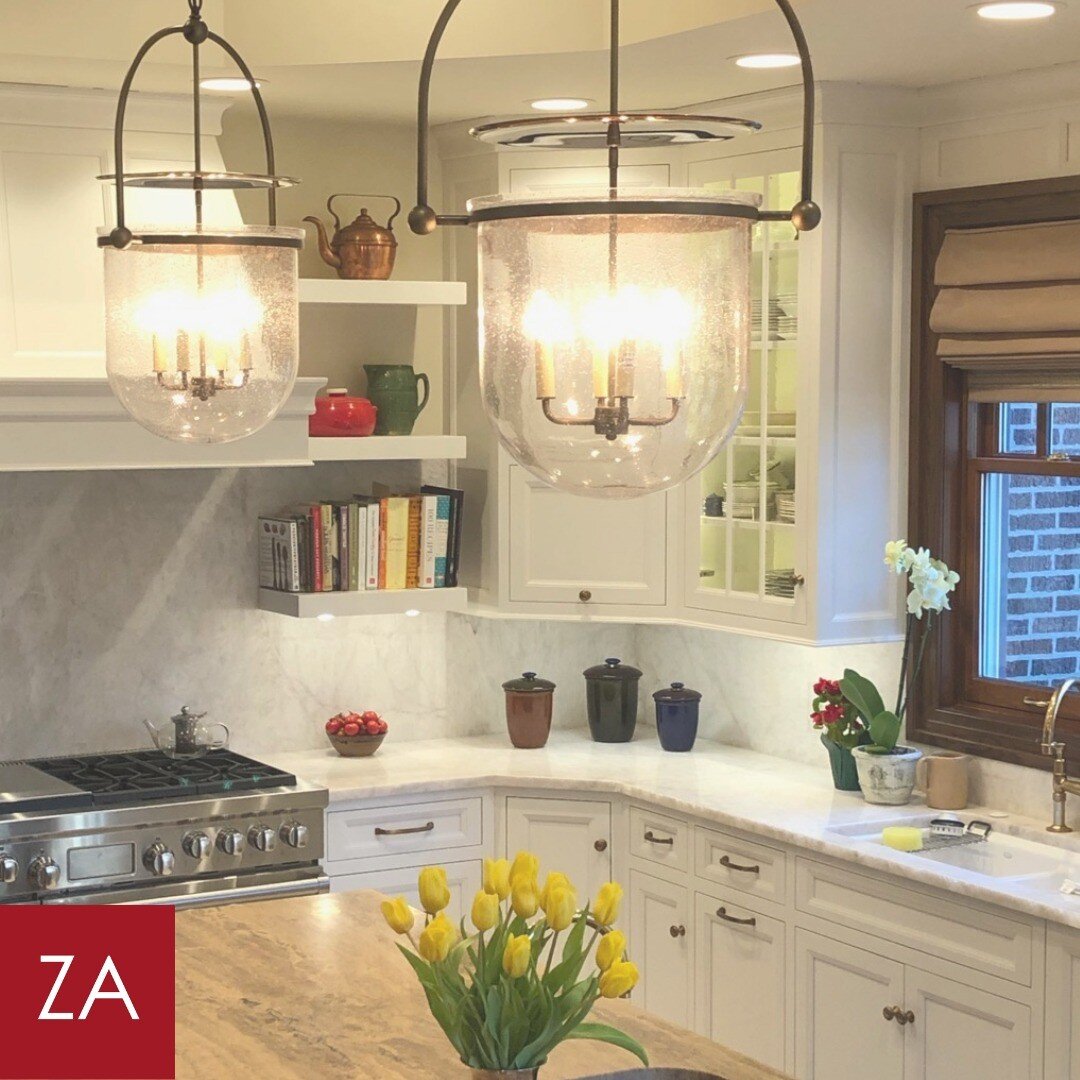 The Urban Smokebell pendants from @urbanelectricco complete this elegant kitchen.