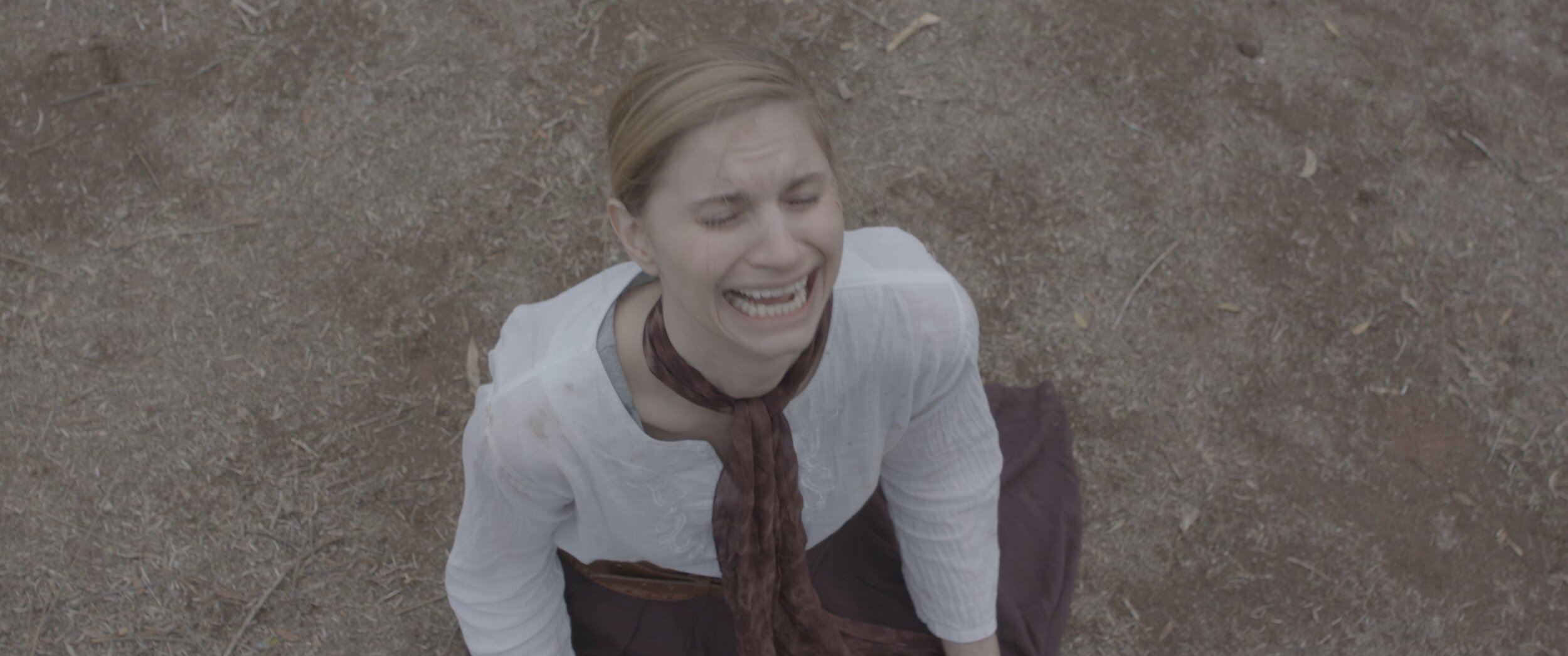 Meira crying after Yael dies from falling out of a tree.