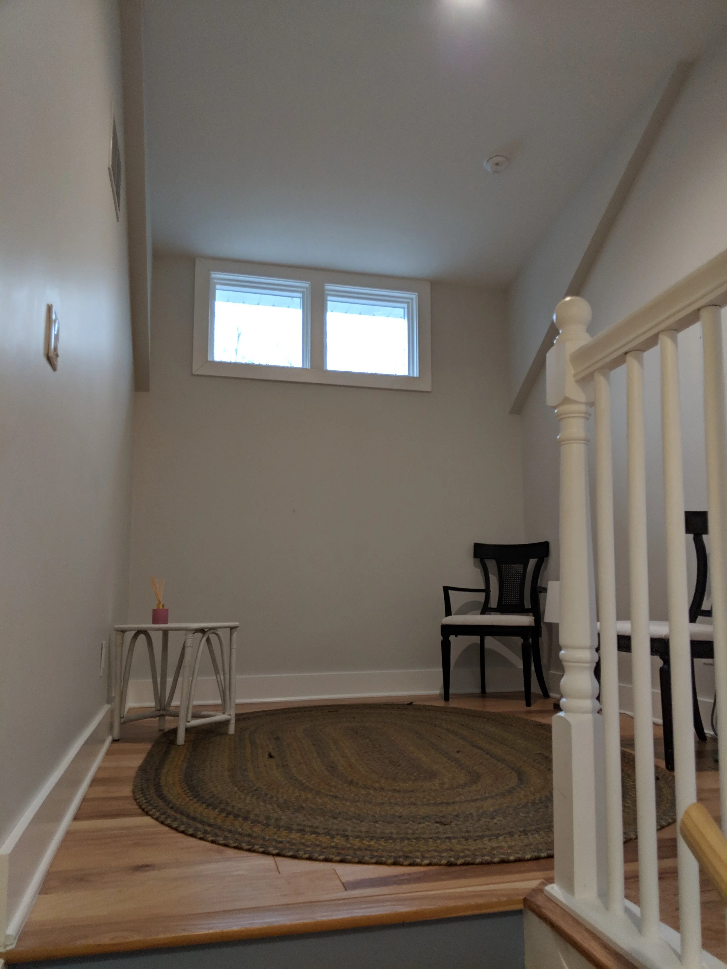 Before, the top of the stairs was a dead space, begging for a more exciting use.