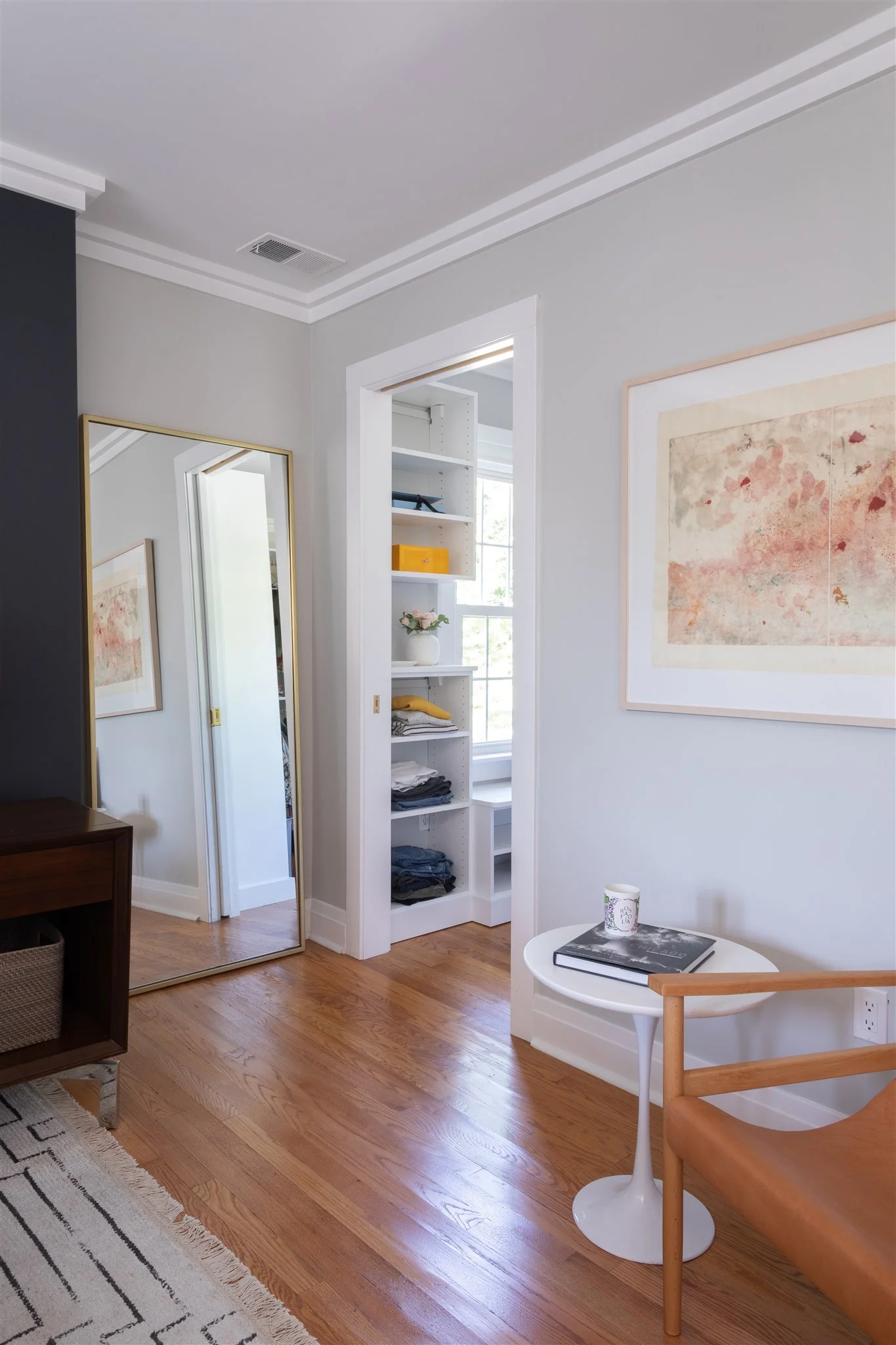 The closet acts as a buffer space between the bedroom and bathroom and creates a true “suite” for the couple to enjoy.