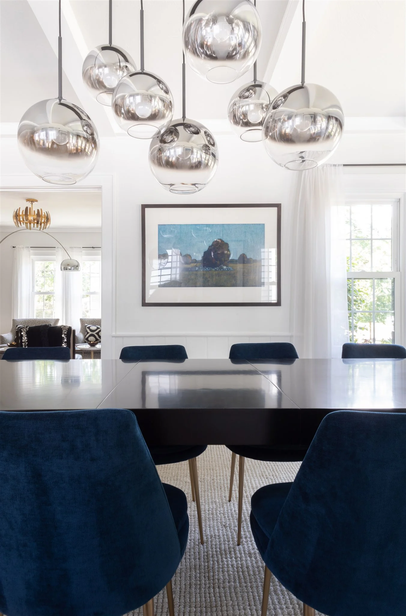 I couldn’t get enough of the chandelier! It’s quiet yet bold at the same time and adds the perfect amount of drama to the space.