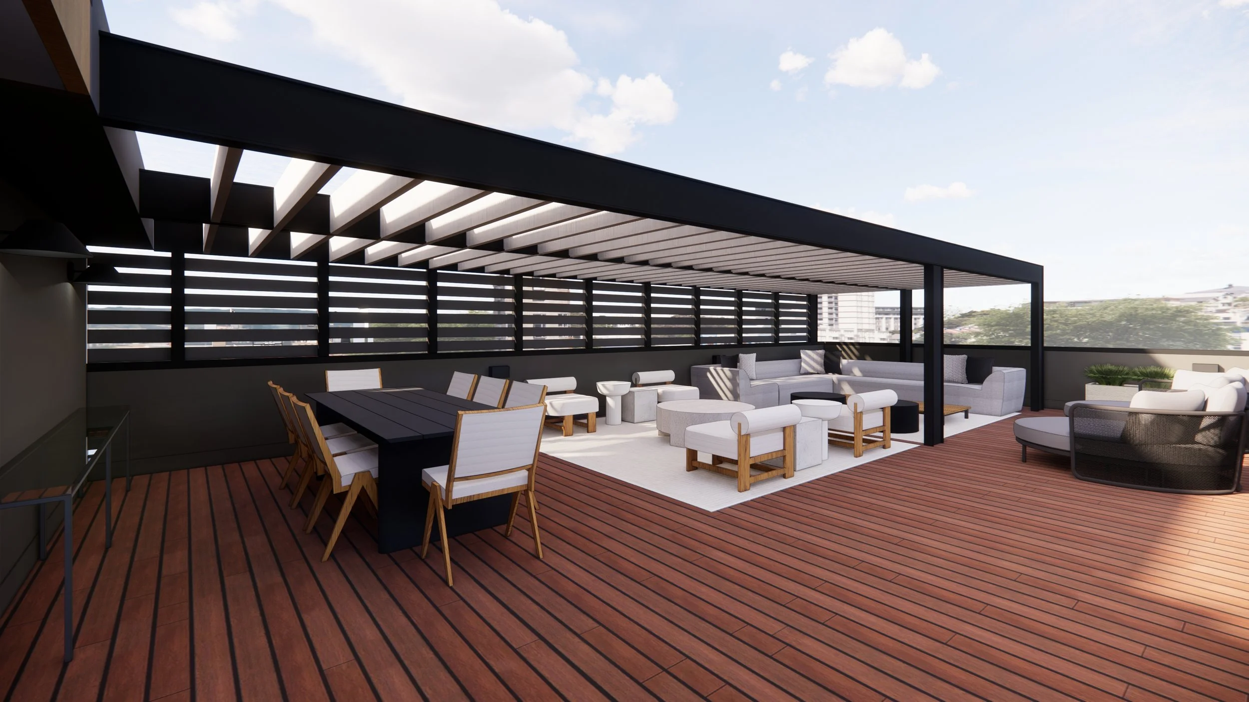 Rooftop terrace with wooden flooring, modern outdoor furniture including a dining table, chairs, and lounge seating under a pergola with slatted roof, overlooking city buildings and a partly cloudy sky.