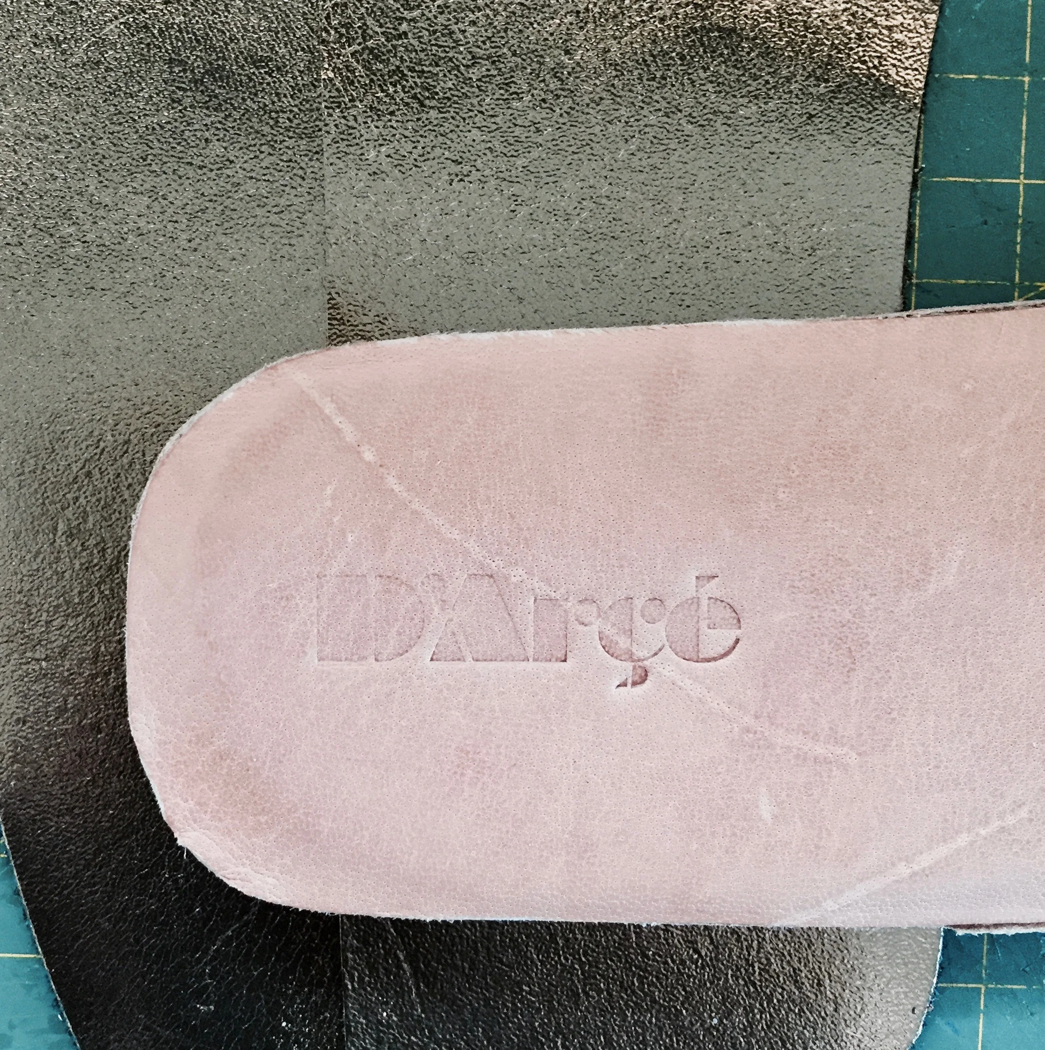 Upper soles are cut from kangaroo leather too which may include naturally occurring scars