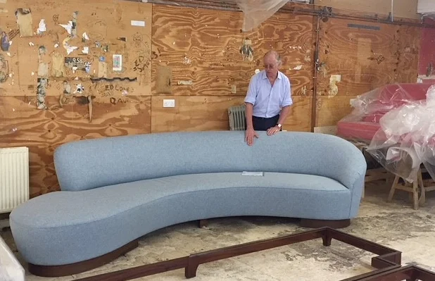 Hugh showing an amoeba sofa that we have just made for a client.