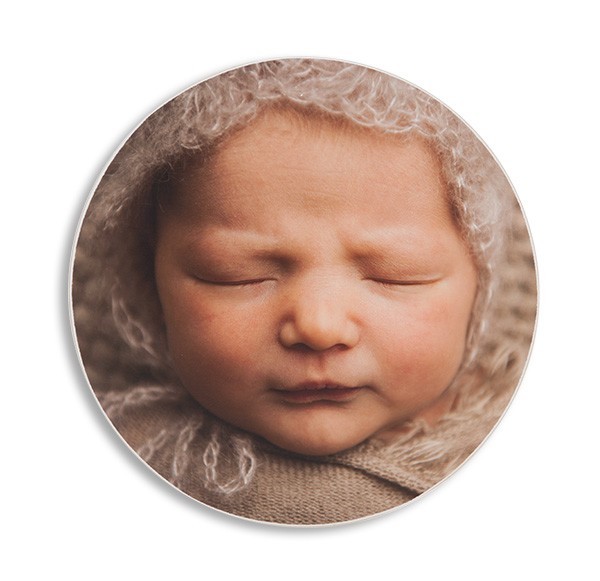 Hva med et bilde i sirkel? Passer ypperlig på babybilder!