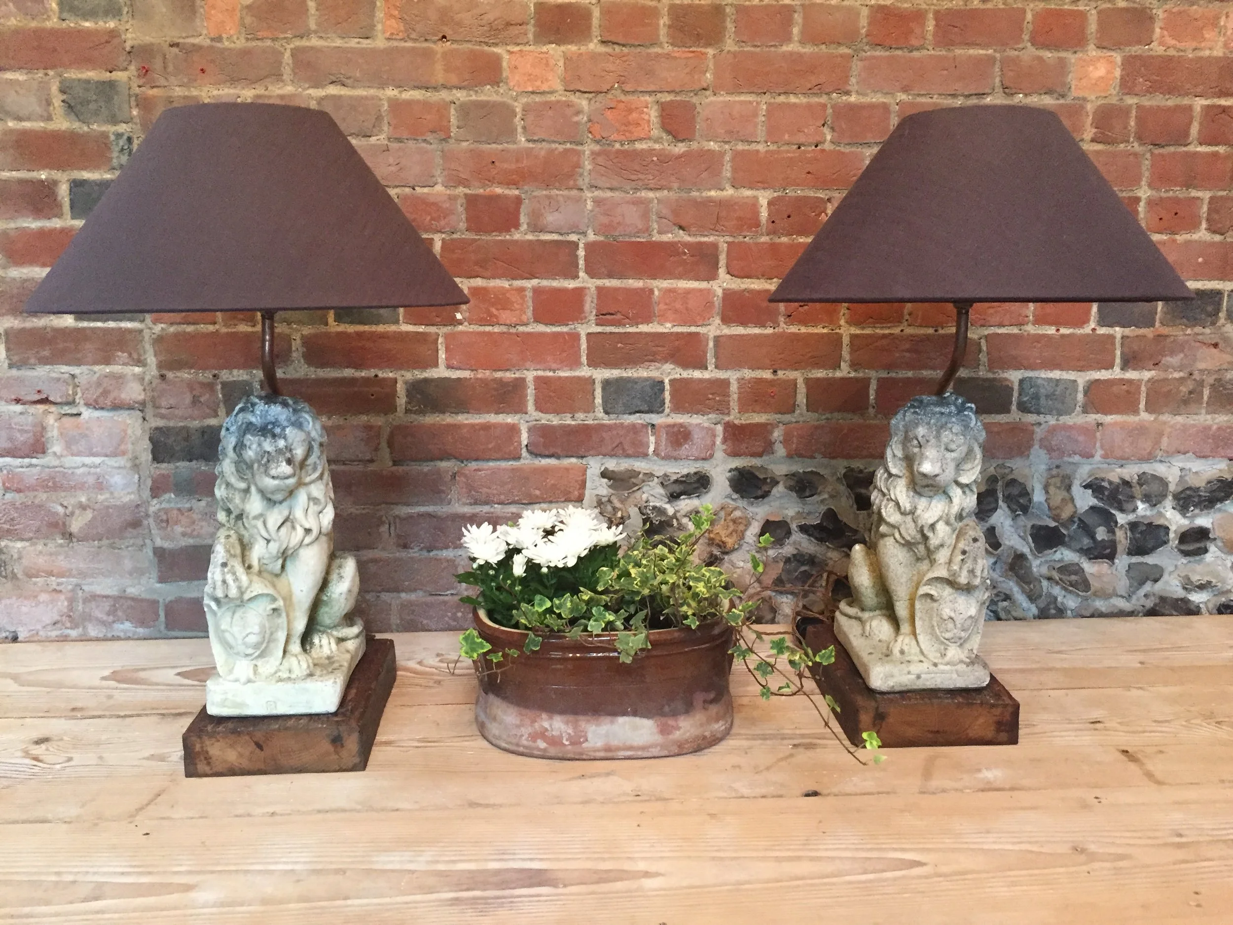 A pair of leonine table lamps. Unique! 85cm high. SOLD