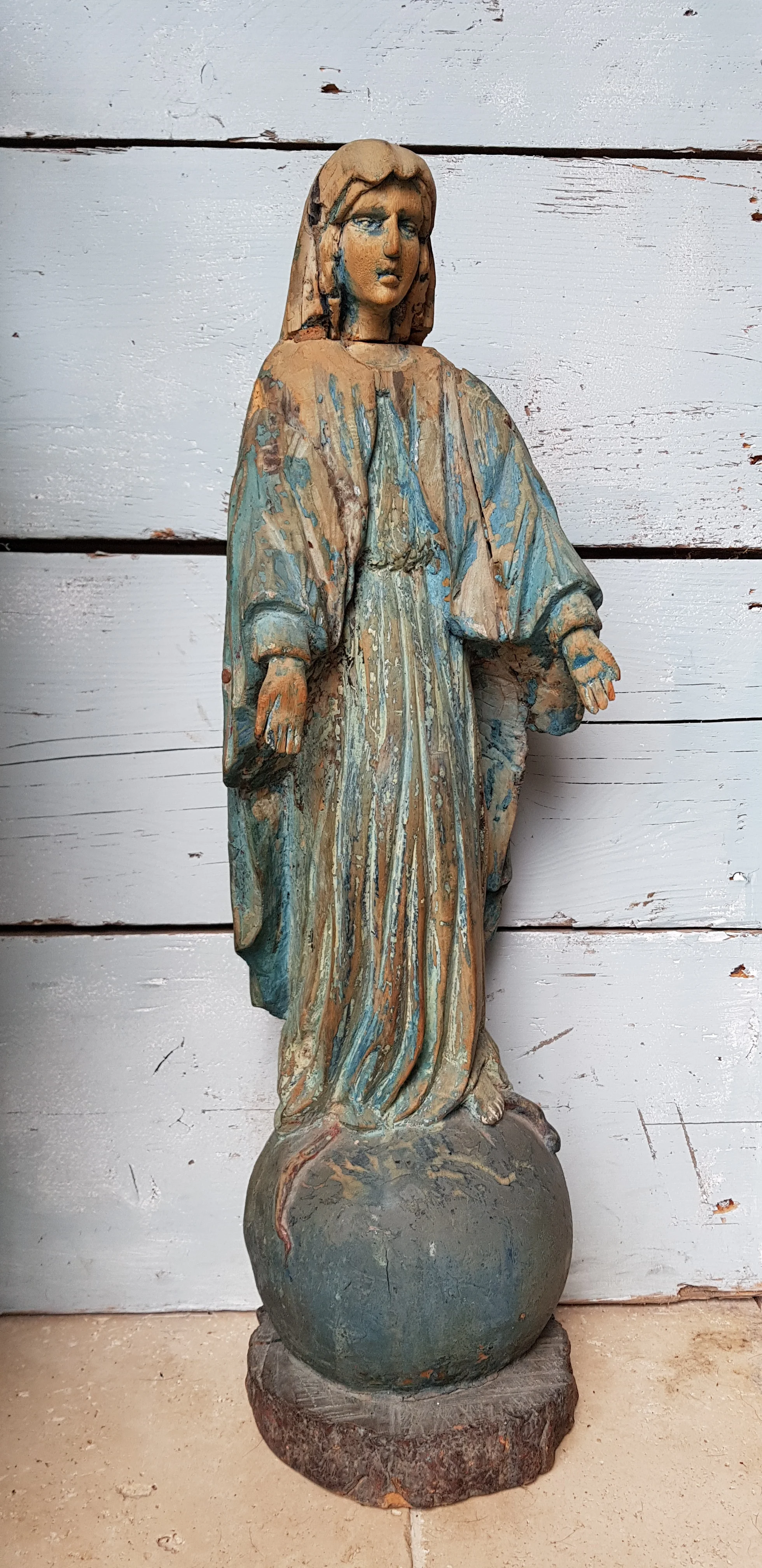 Early religious carved figure in original paint. £495.