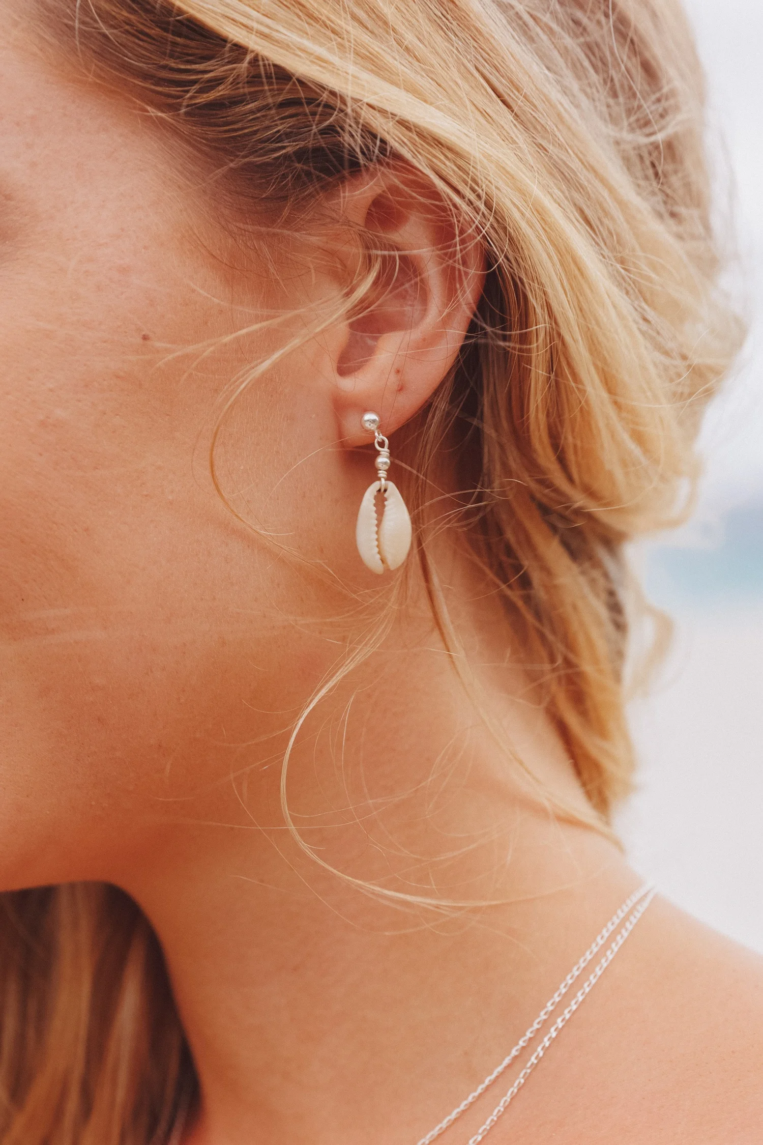 cowrie-drop-studs-two-in-the-sun.jpg