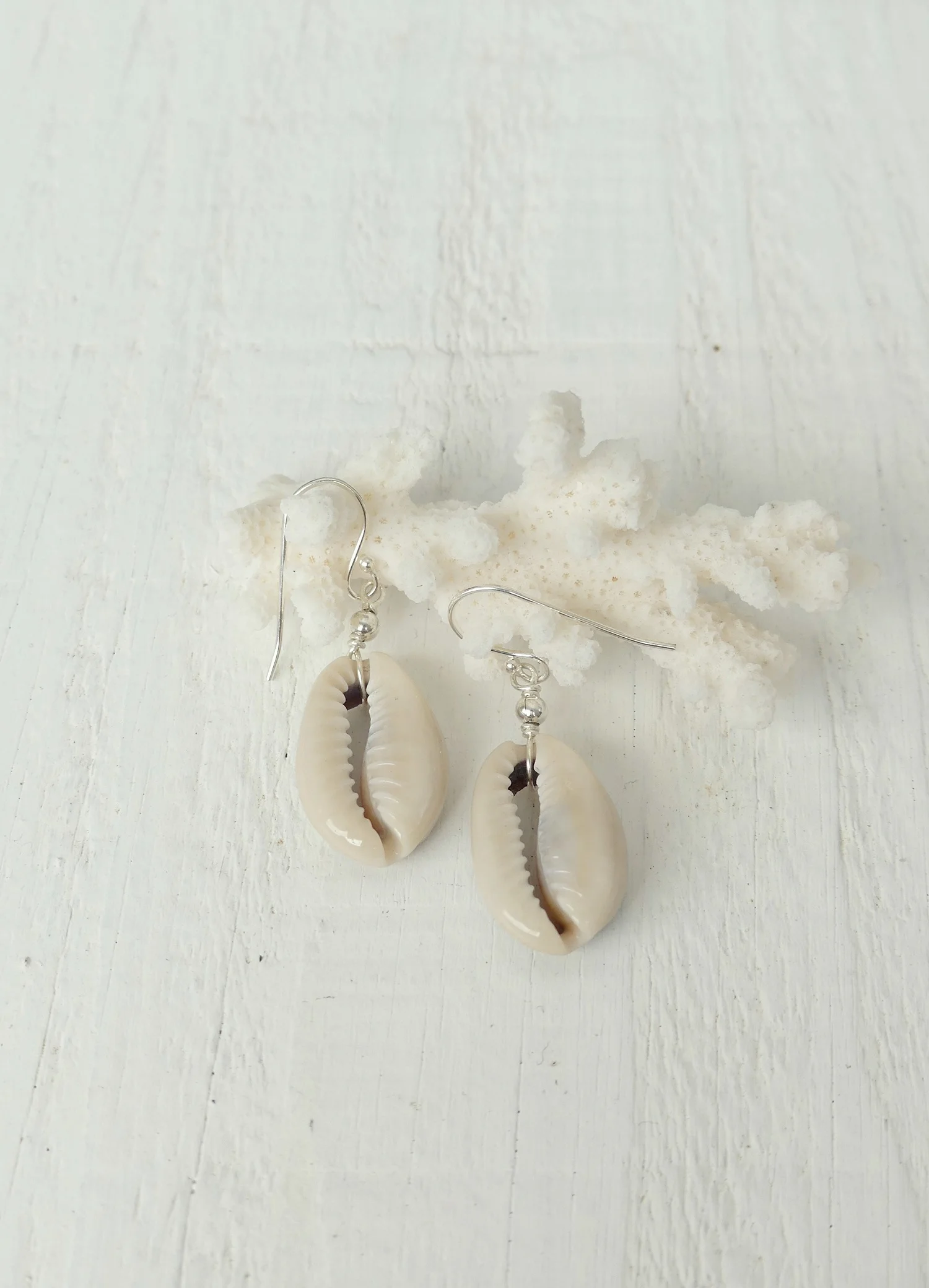 Cowrie-earrings-two-in-the-sun.JPG