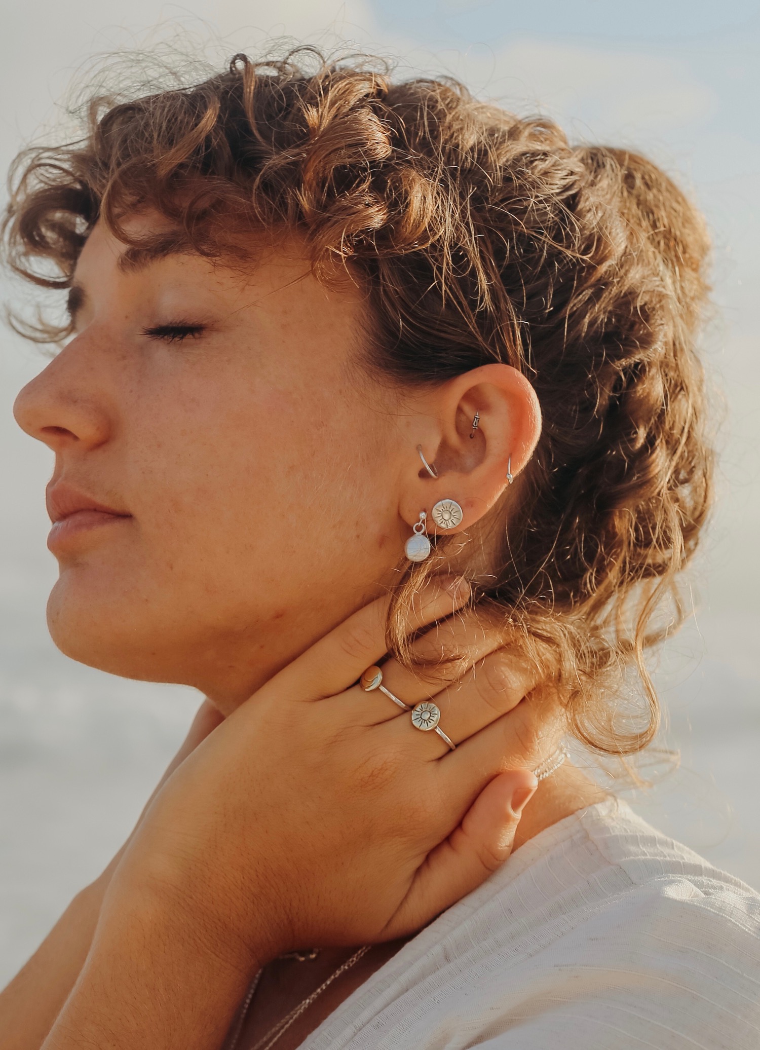 sun_moon_studs_silver_two_in_the_sun.jpeg