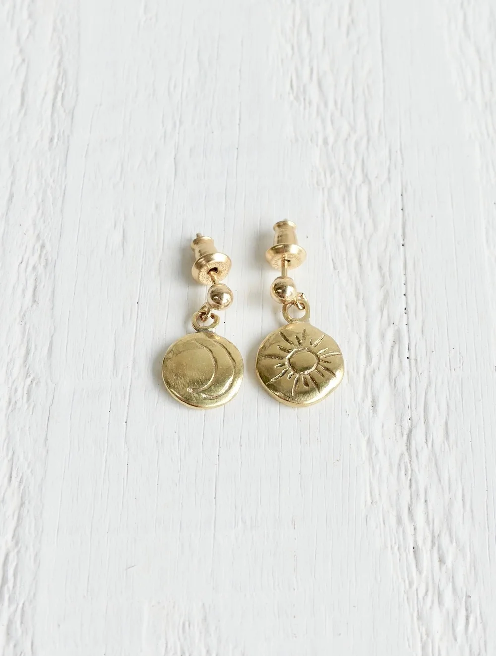 sun-and-moon-brass-studs-two-in-the-sun.jpeg