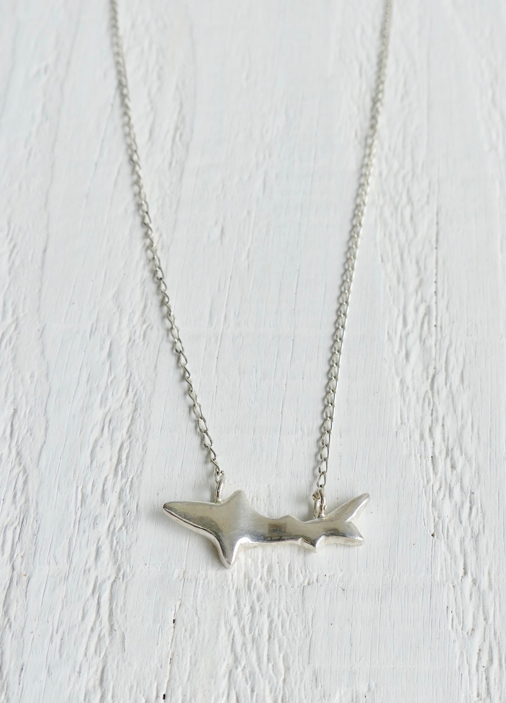 shark-pendant-silver-two-in-the-sun.jpeg