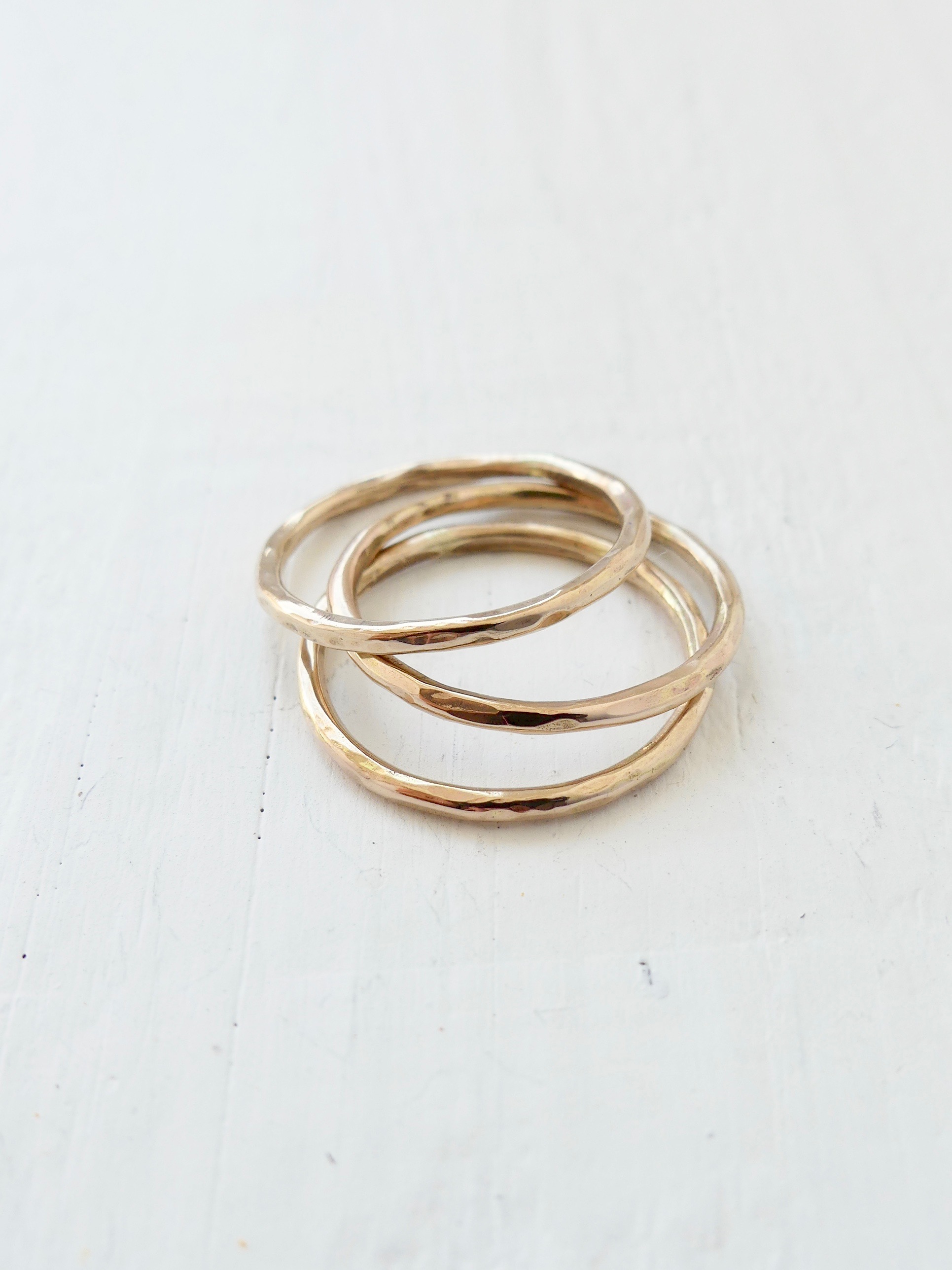 gold-stacker-rings-two-in-the-sun.jpeg