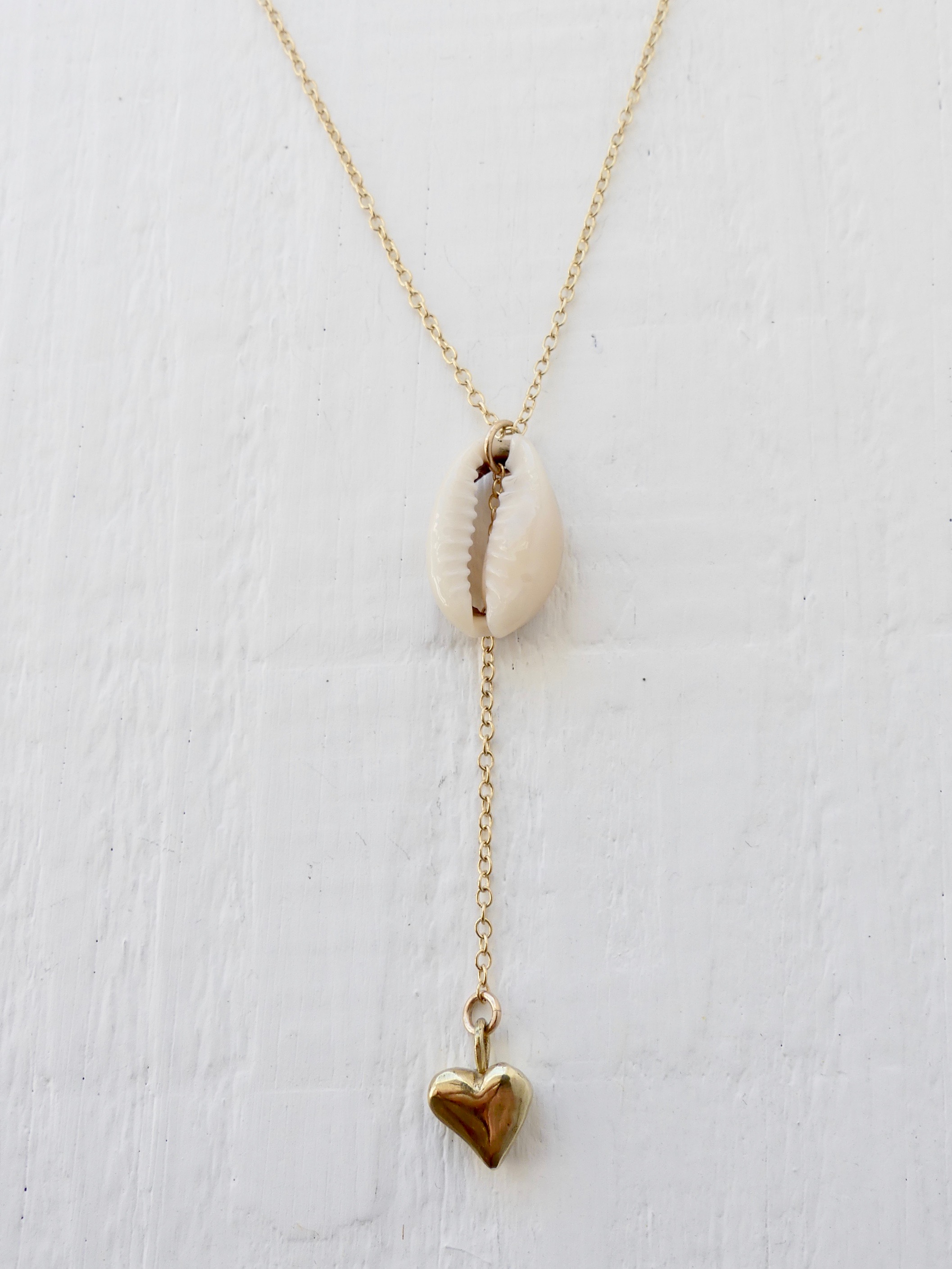 ocean-heart-gold-necklace-bloom-two-in-the-sun2.jpeg