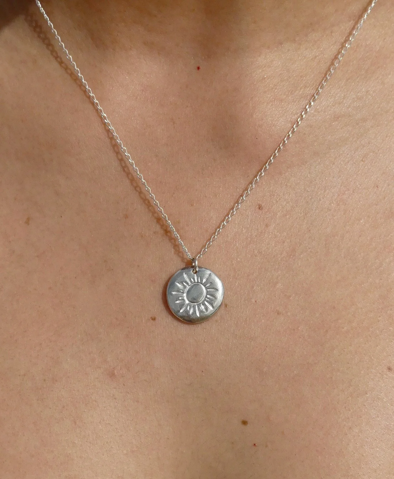 Silver-Sun-Necklace-close-up.jpeg