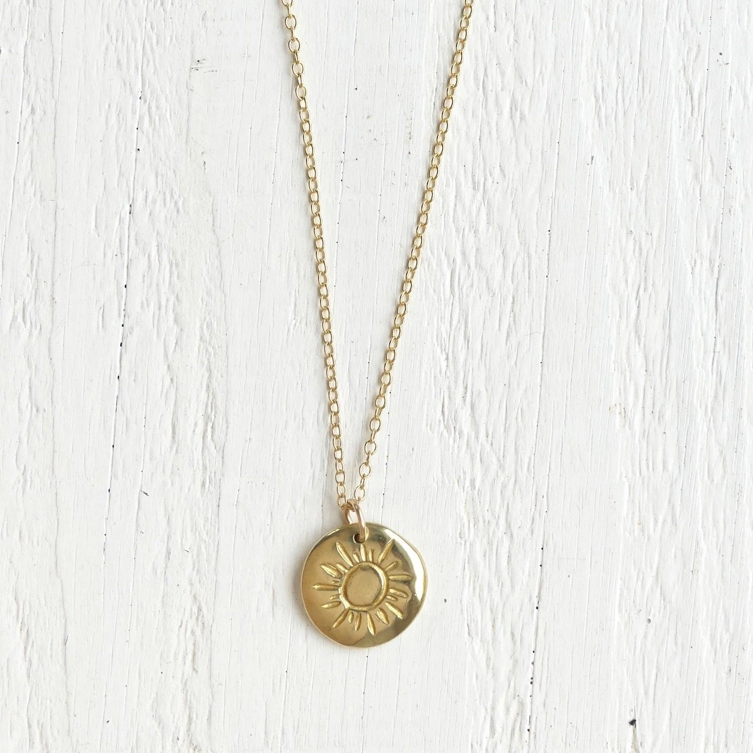Gold Sun Necklace from $125