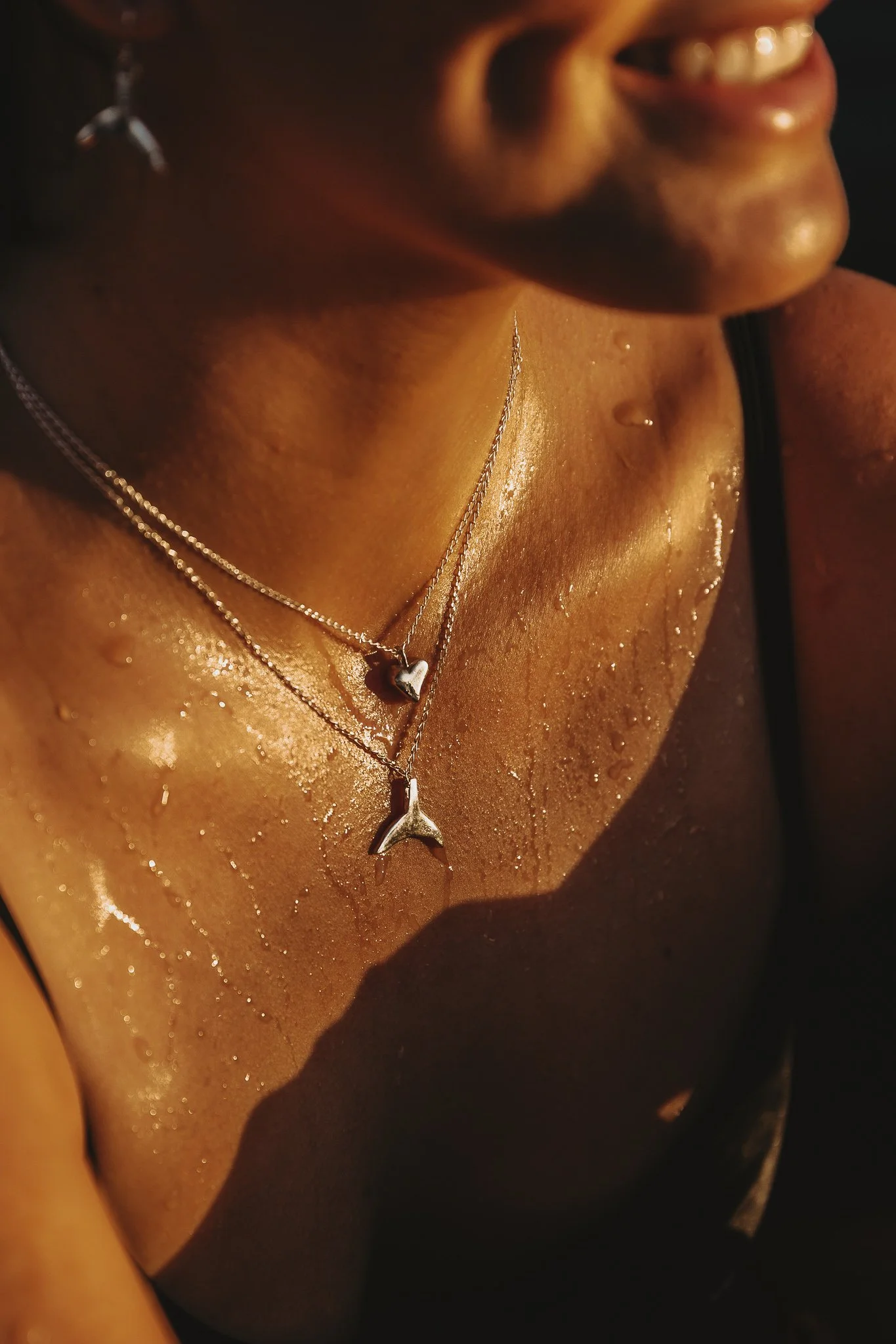 Silver Whale Tail Necklace from $120