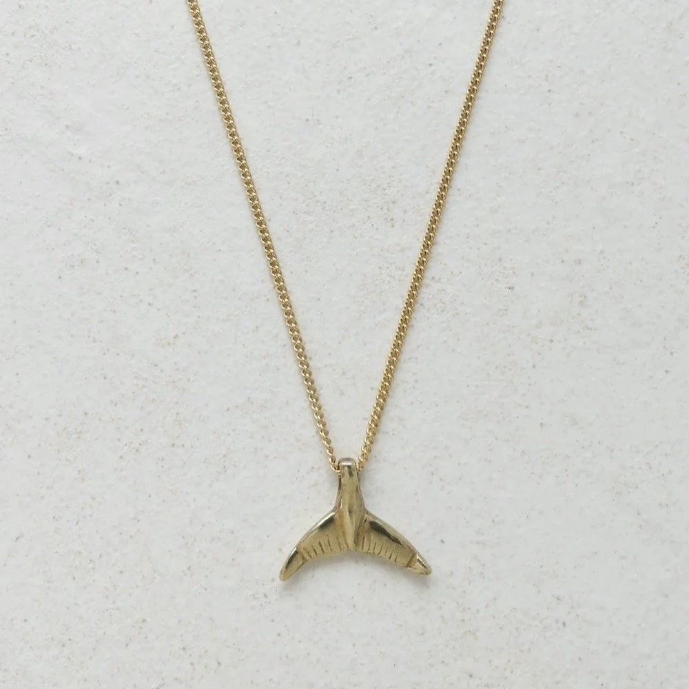 Gold Whale Tail Necklace from $125