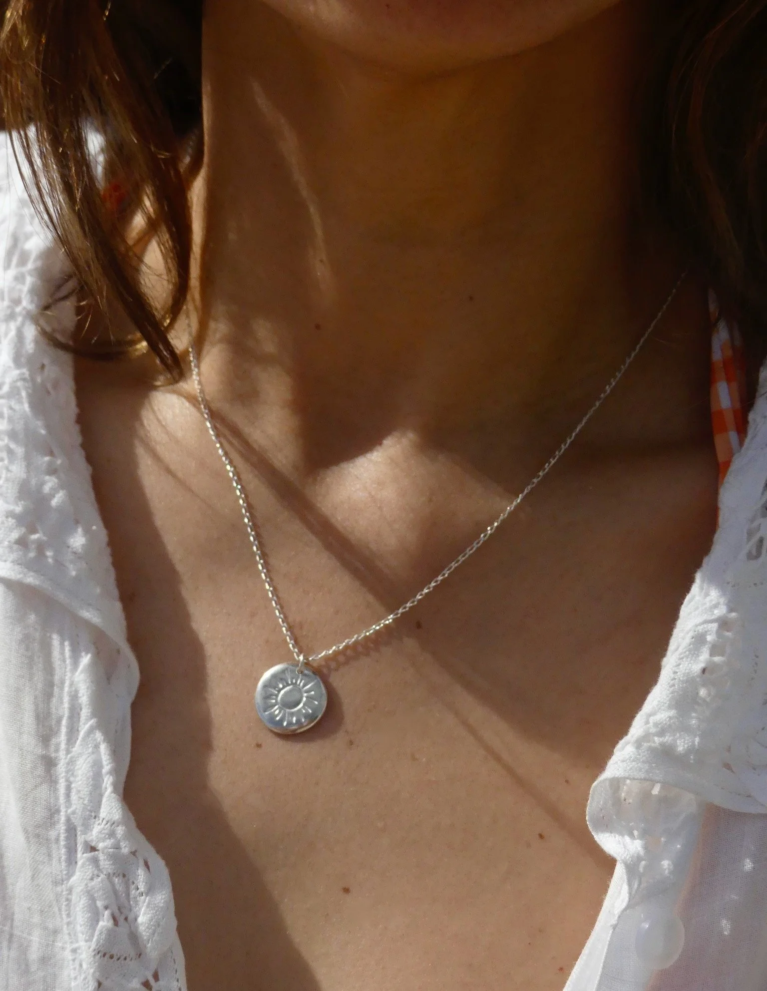Silver Sun Necklace  $145