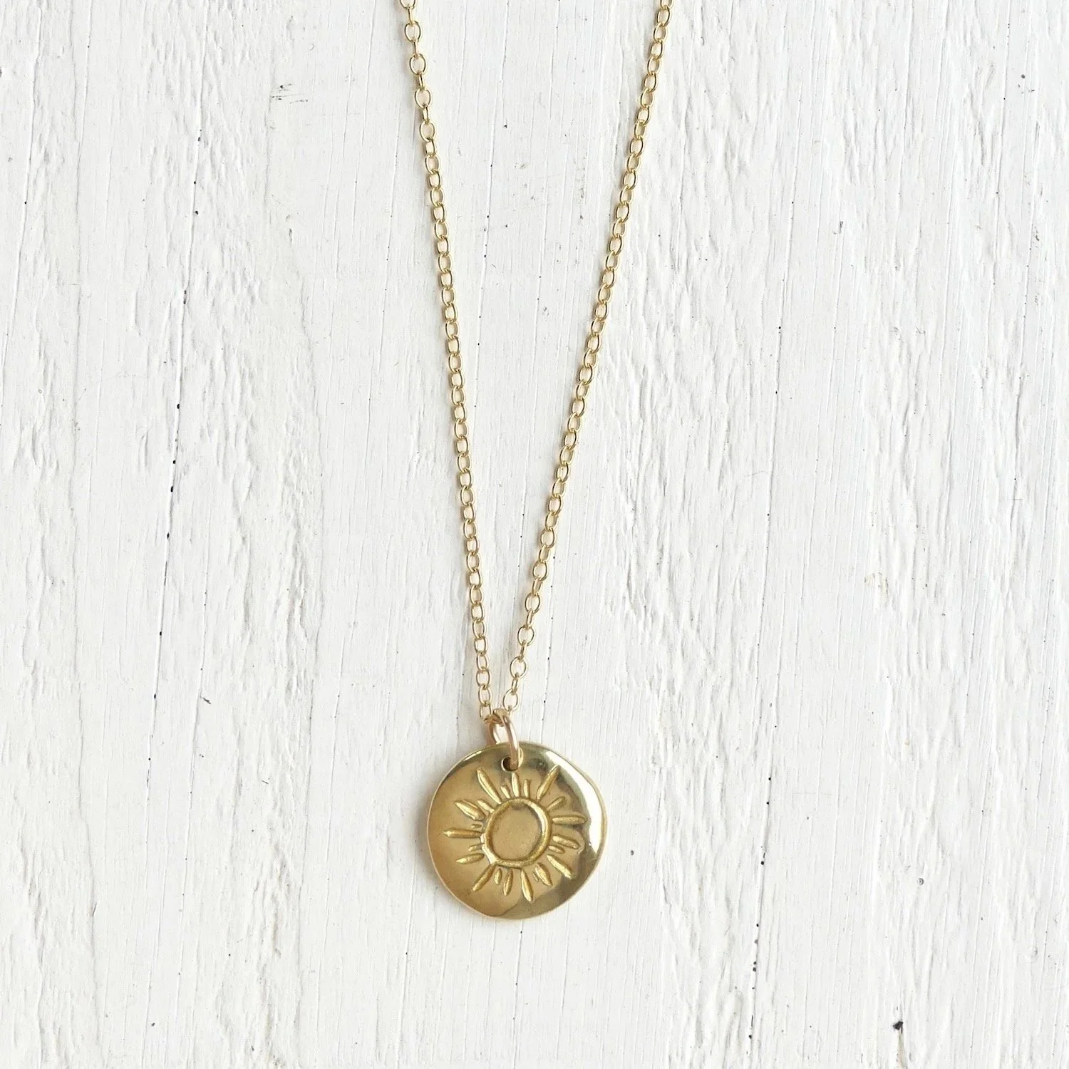 Gold Sun Necklace $125