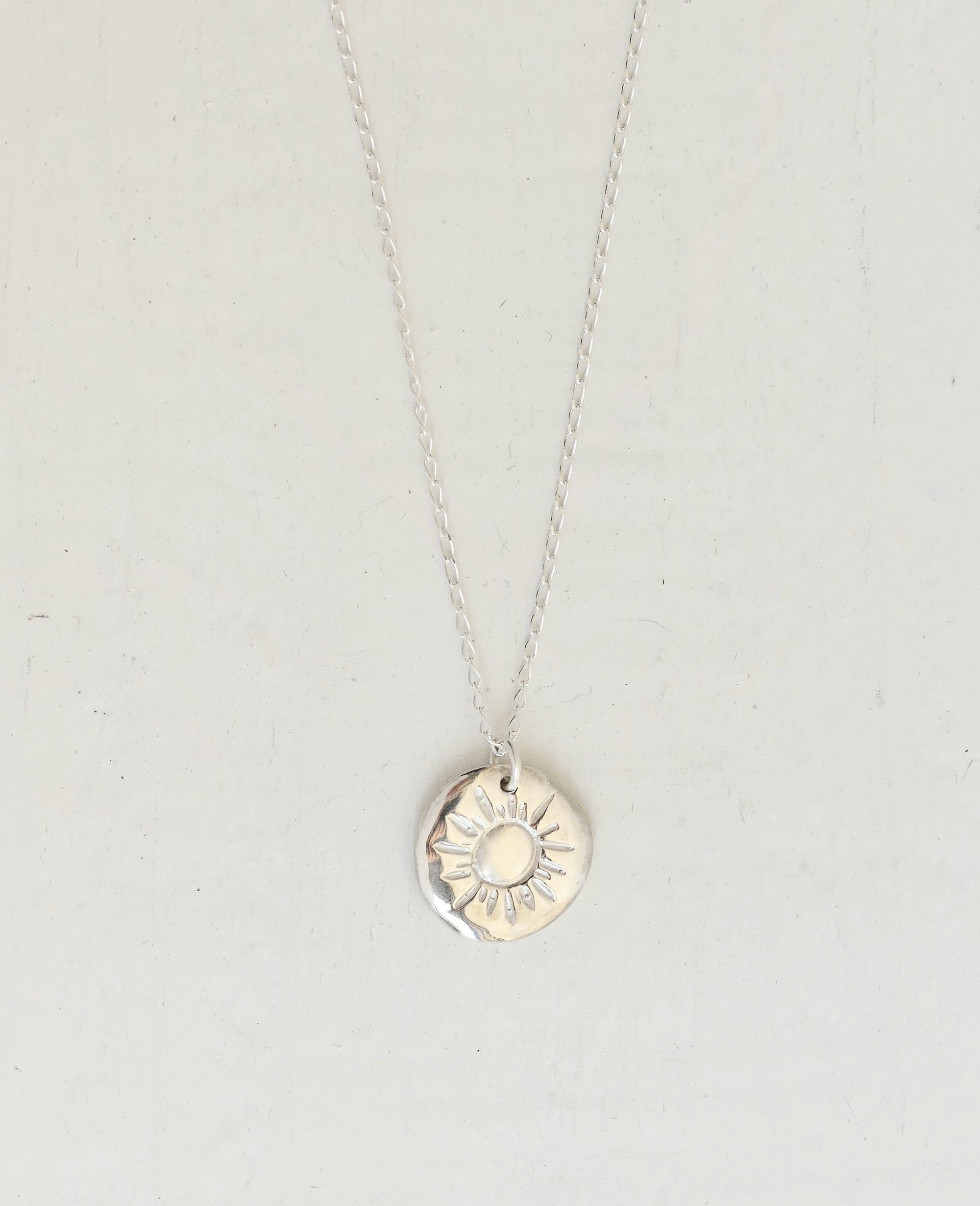 silver-sun-pendant-chain-necklace-two-in-the-sun.jpeg