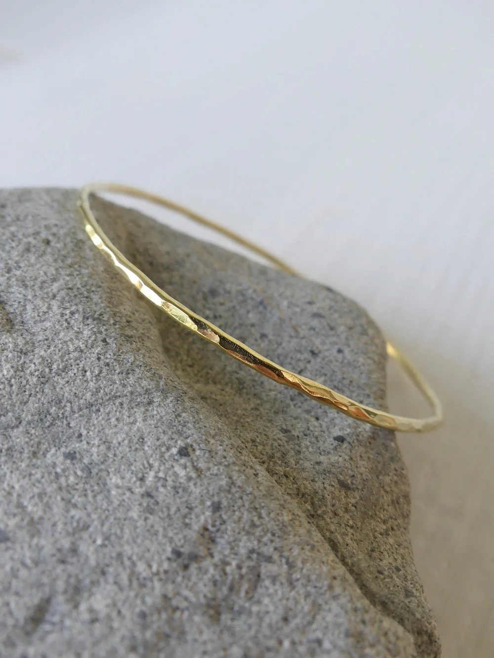 brass-bangle-gold-hammered-two-in-the-sun.jpeg