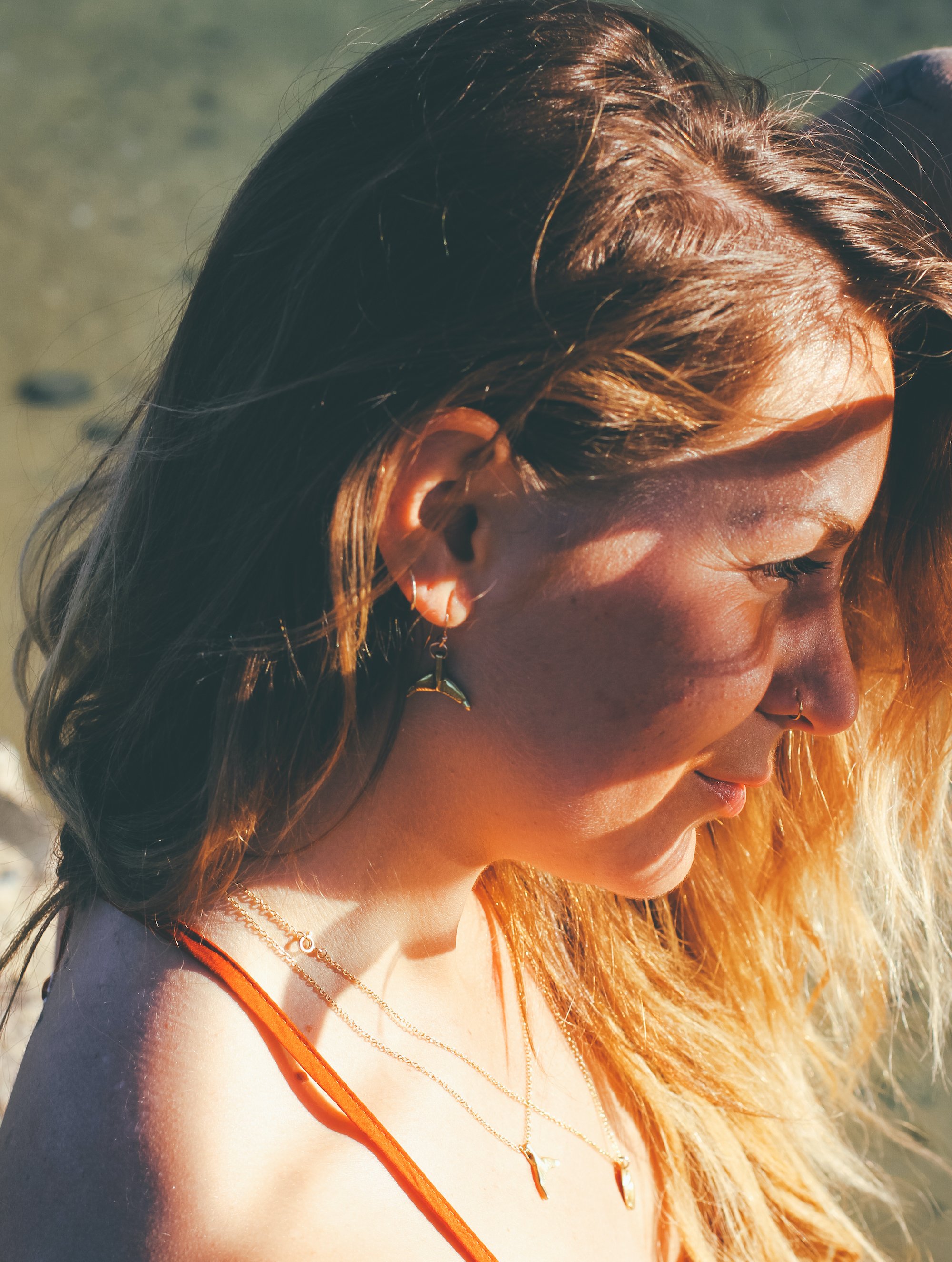 whale-tail-brass-gold-earrings-two-in-the-sun.JPG