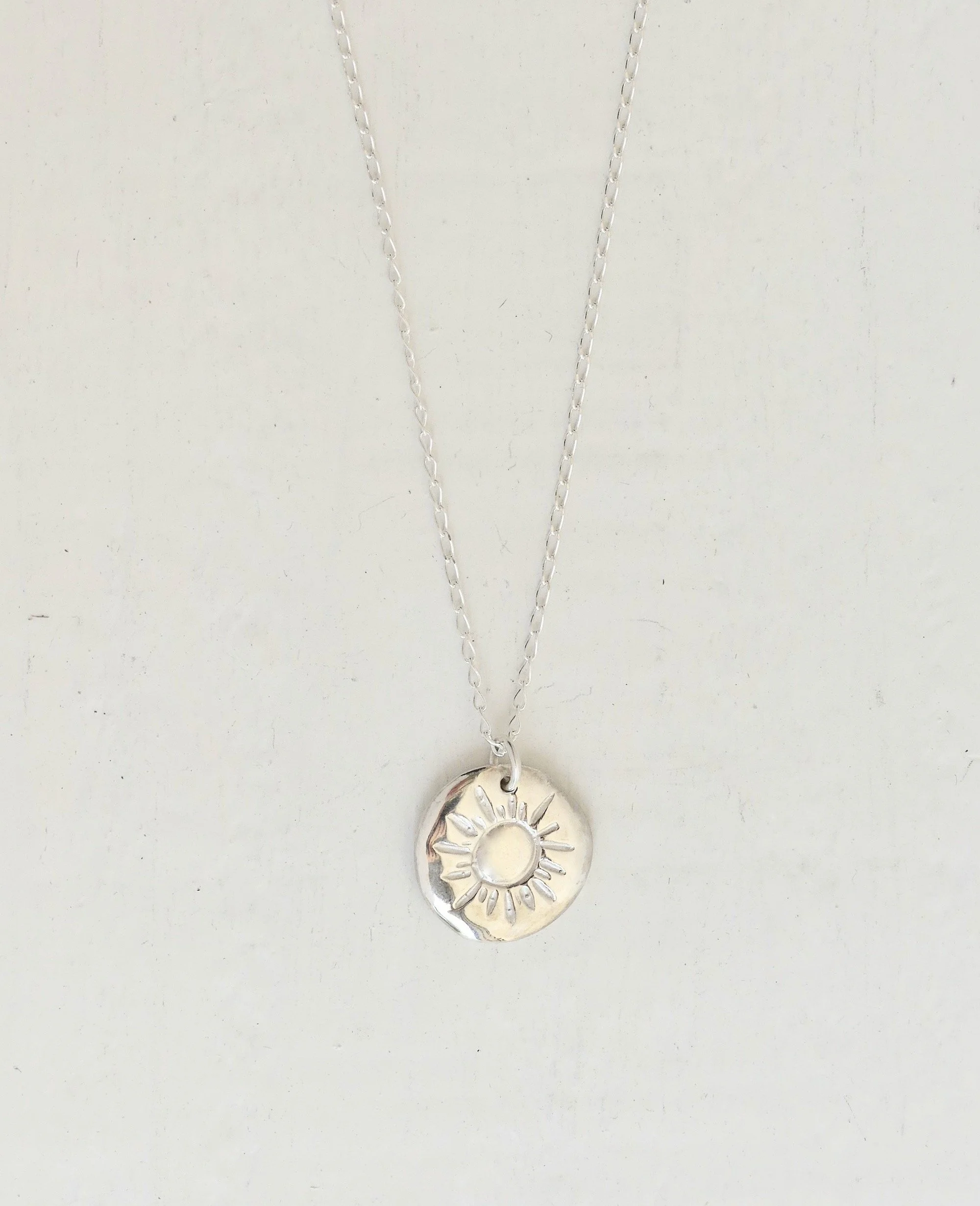 silver-sun-pendant-chain-necklace-two-in-the-sun.jpeg