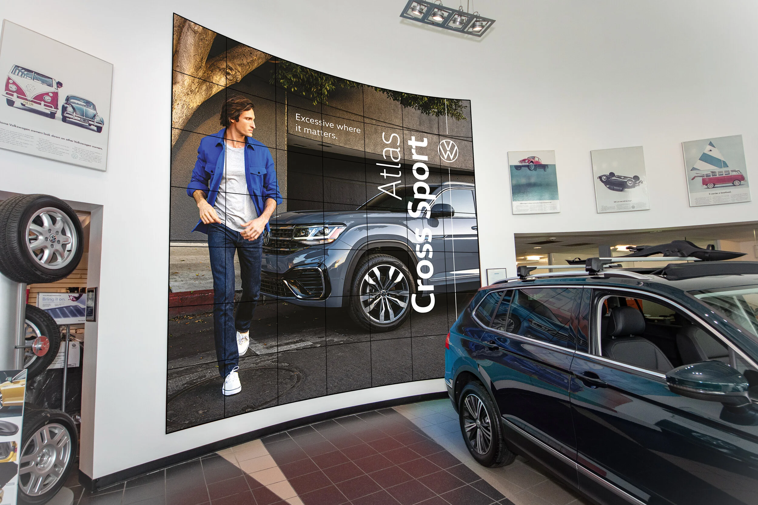 VW_Showroom_2StoryFocalWall_InSitu_Final.jpg