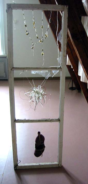 Two Self Portraits from Trash ; Three Sides of Me window frames, best-date-passed food and mixed media, 2000