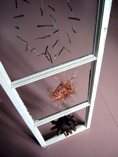 Two Self Portraits from Trash; If I Were Someone Else window frames, best-date-passed food and mixed media, 2000