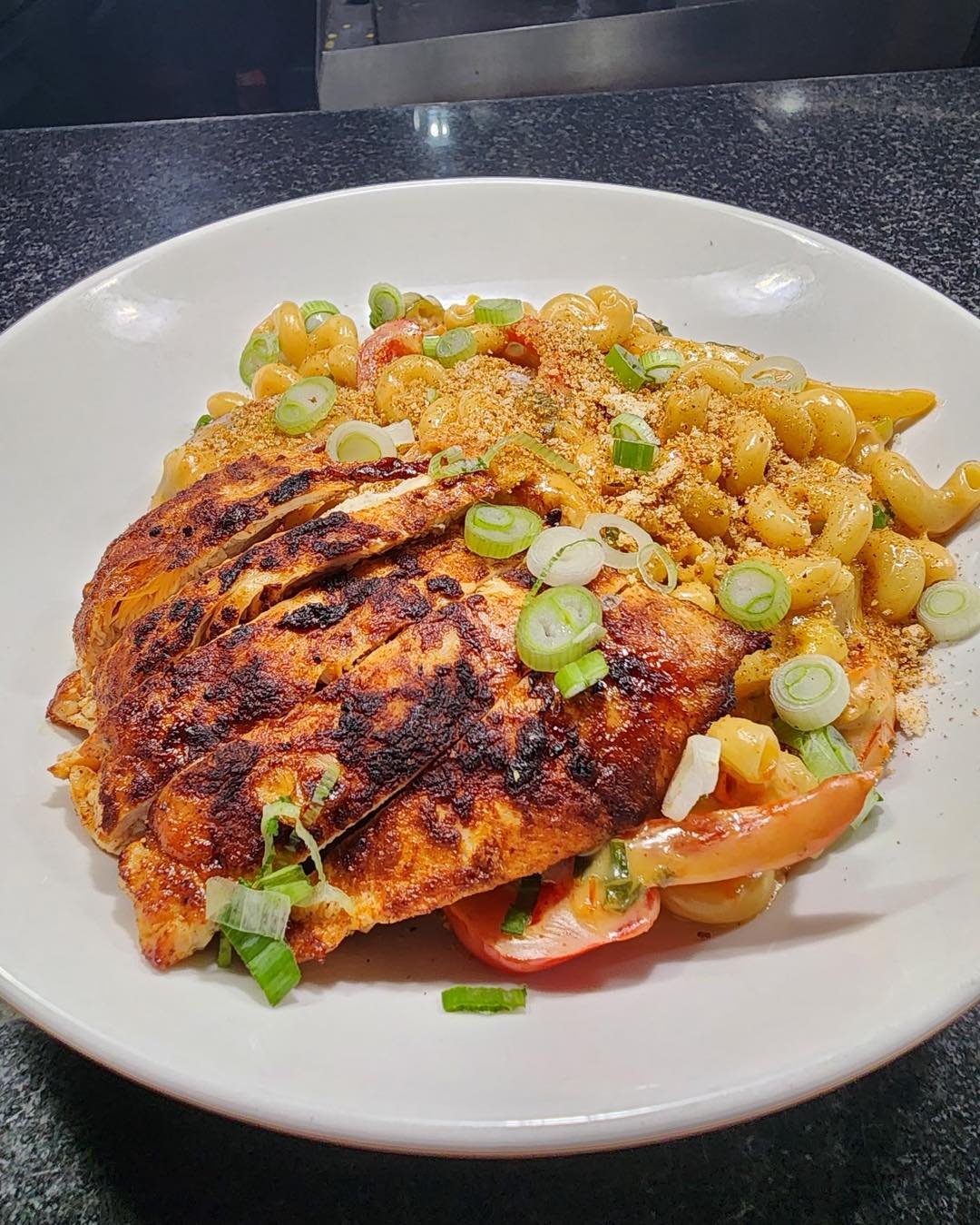 New special this week: Cajun Mac &amp; Cheese 🤤

Cavatappi noodles, Andouille sausage, roasted corn, bell peppers, okra, and roasted tomatoes tossed in Cajun cheese sauce topped with a blackened chicken breast, seasoned bread crumbs, and green onion