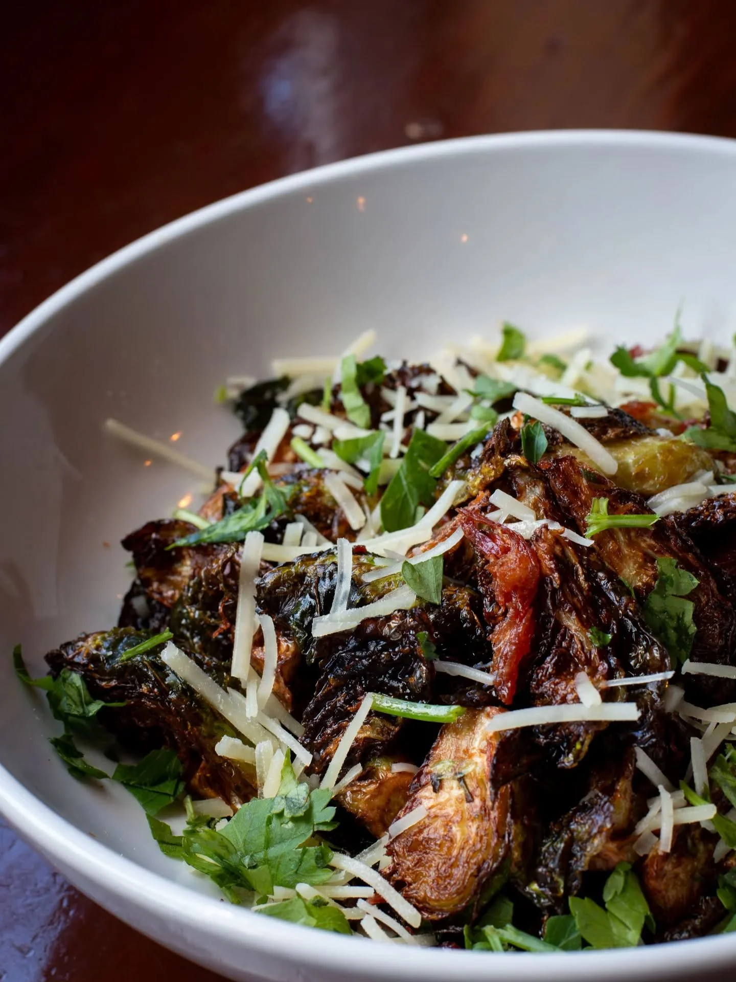 Deep-fried Brussels Sprouts tossed with crispy pulled bacon, brown butter, parmesan, and parsley. Order them for the table, watch them disappear.